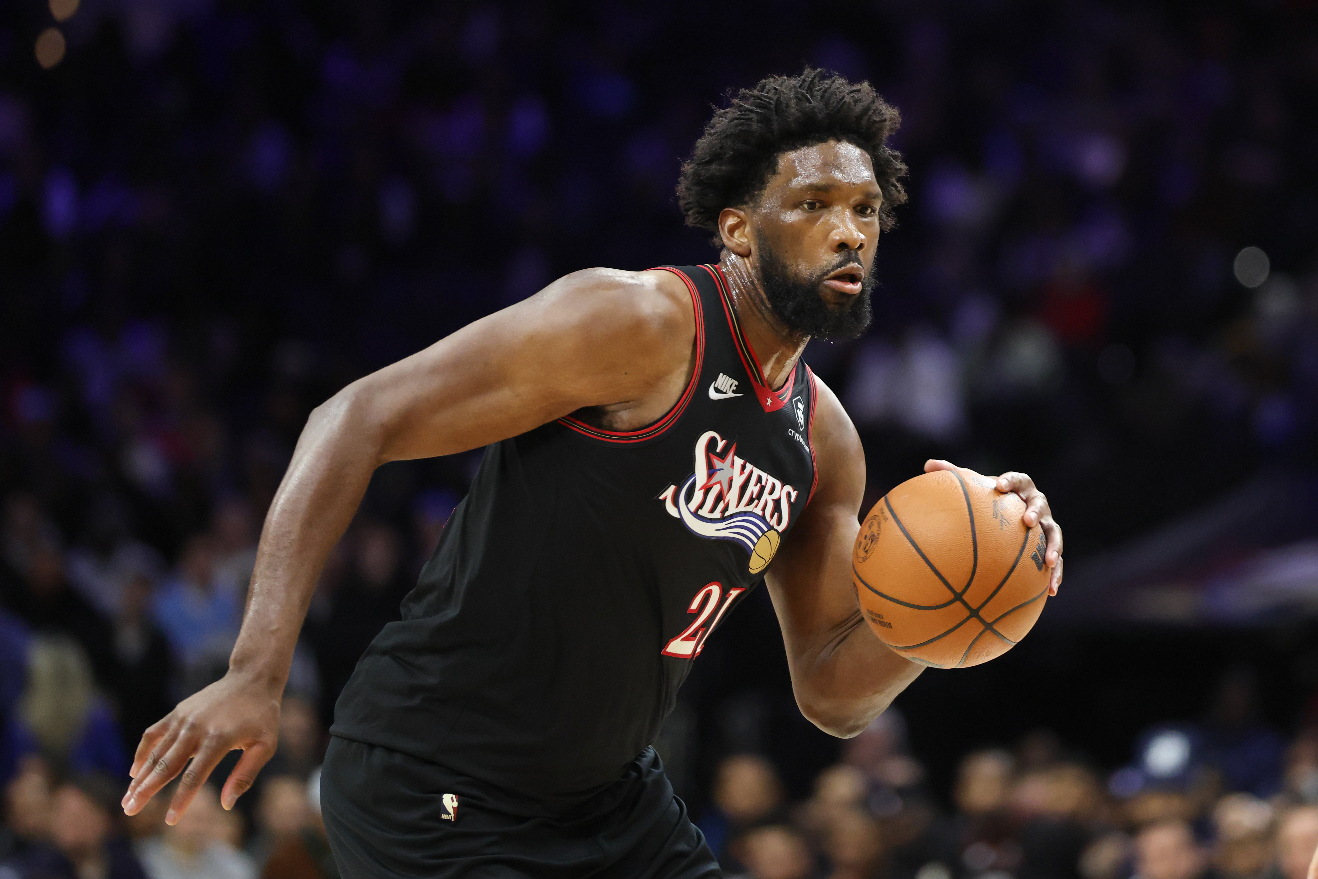 Philadelphia 76ers center Joel Embiid (21), seen here dribbling the ball, leads our Nuggets vs. 76ers player props.