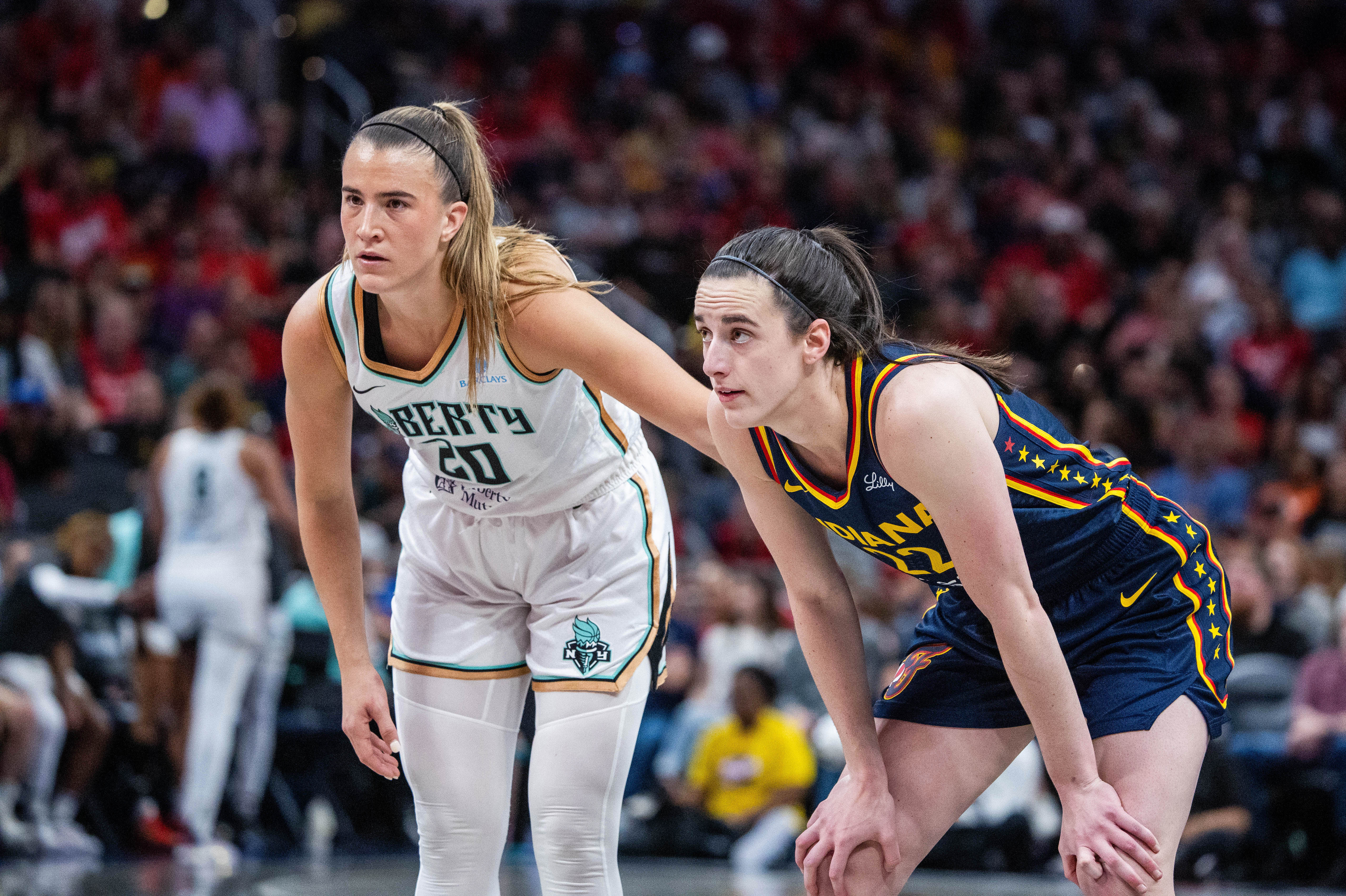 Sabrina Ionescu (20) has the New York Liberty atop the WNBA championship odds, while Caitlin Clark (22) leads the WNBA MVP odds. 