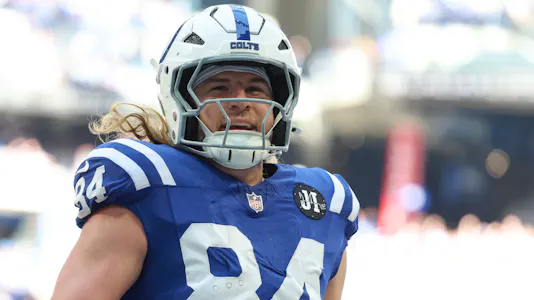 Indianapolis Colts tight end Tyler Warren - who's featured in our National Tight End's Day player props - celebrates after scoring a touchdown.