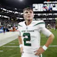 Quarterback Zach Wilson #2 of the New York Jets walks off the field as we look at our Jets vs. Bills Week 11 NFL player prop predictions.