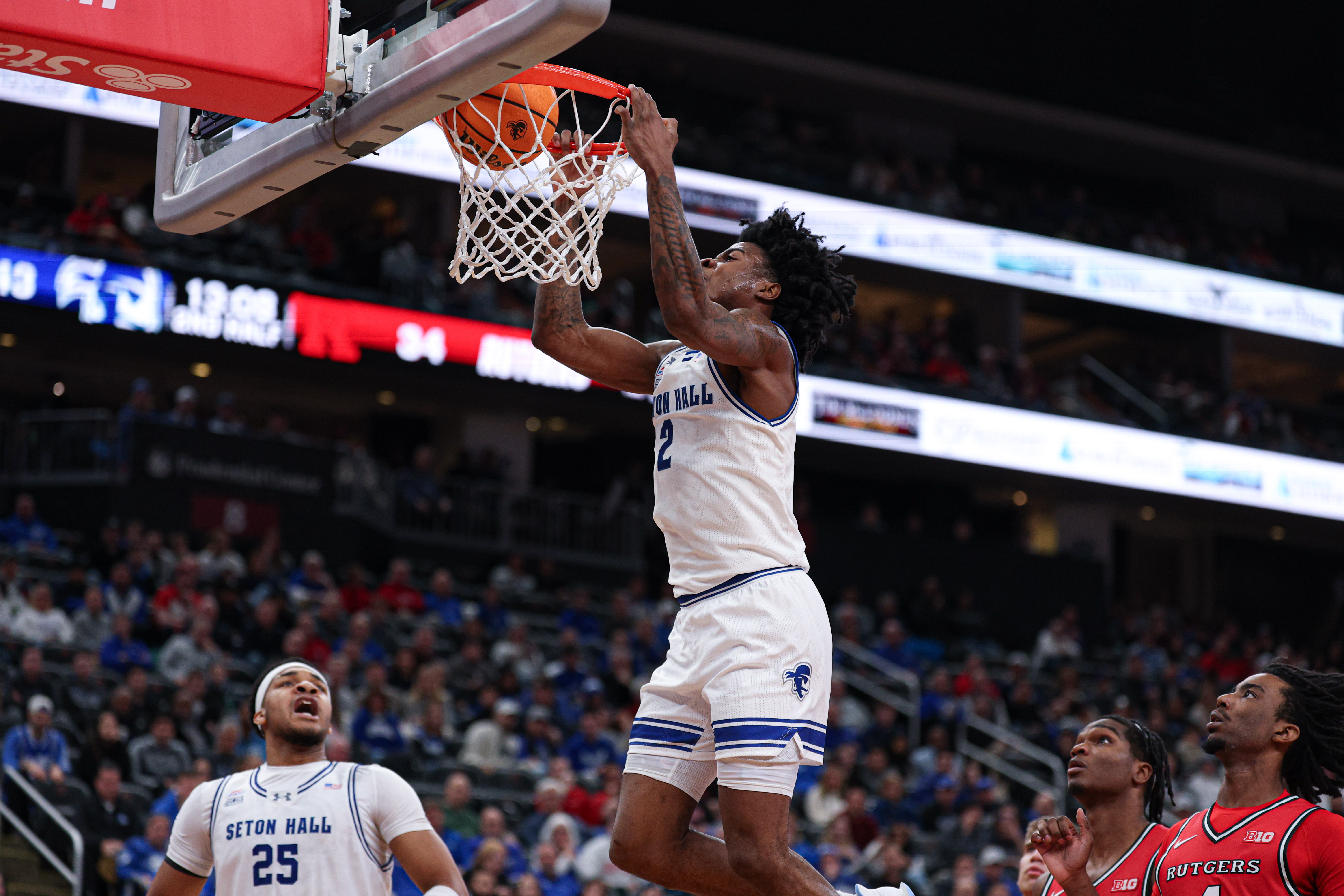 Seton Hall Pirates guard Tajuan Simpkins (2) dunks as we dive into our college basketball best bets today.