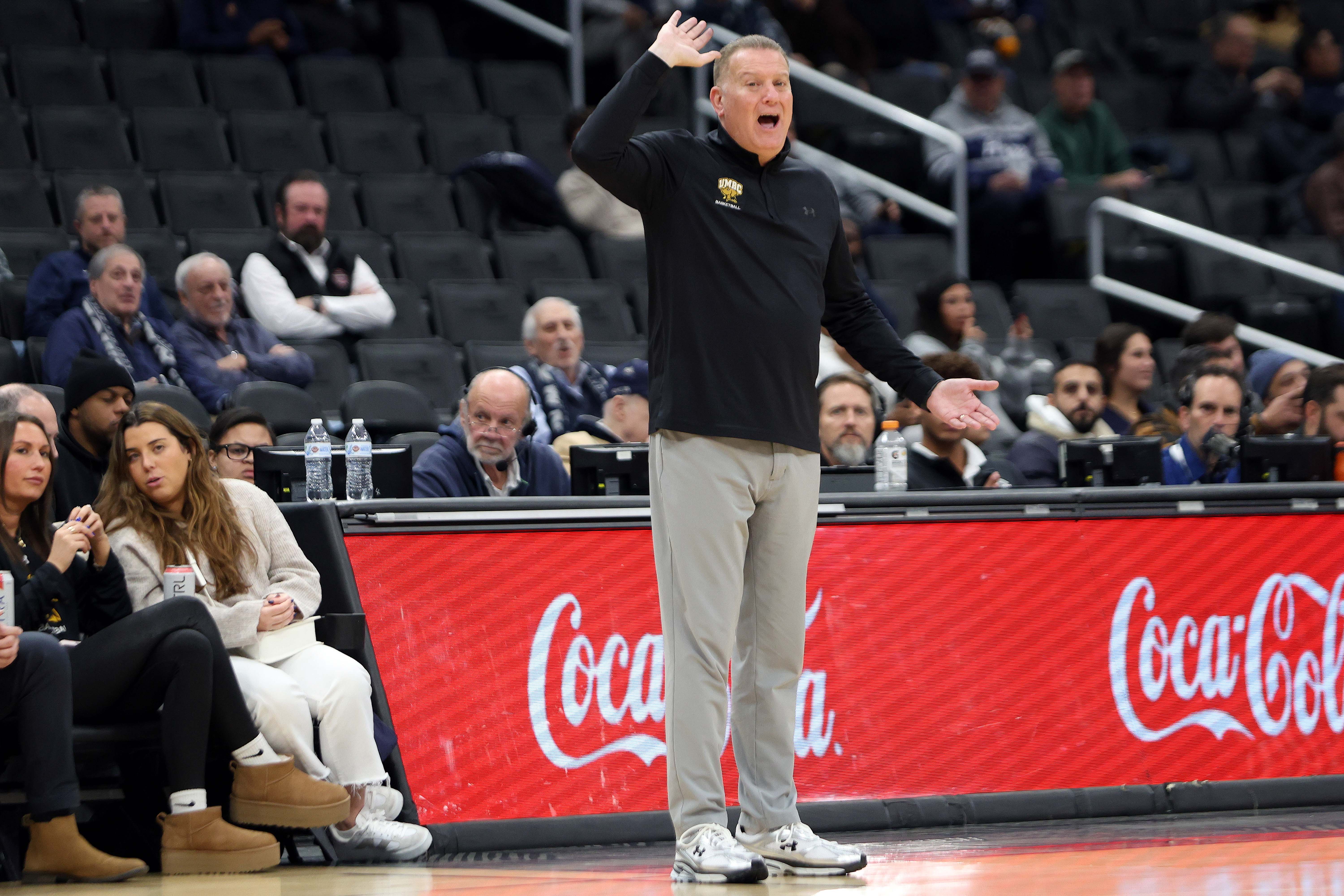 UMBC Retrievers head coach Jim Ferry reacts to a call as we break down our Vermont vs. UMBC prediction.
