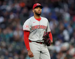 Hunter Greene of the Cincinnati Reds looks on during the game against the Seattle Mariners, and we offer our top MLB player props and expert picks based on the best MLB odds.