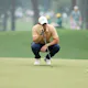 Rory McIlroy of Northern Ireland looks over a putt as we offer our Masters picks and predictions