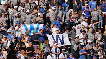 Fans celebrate after the Chicago Cubs defeated the Milwaukee Brewers at Wrigley Field on Aug. 30 as we look at the Illinois July betting report.
