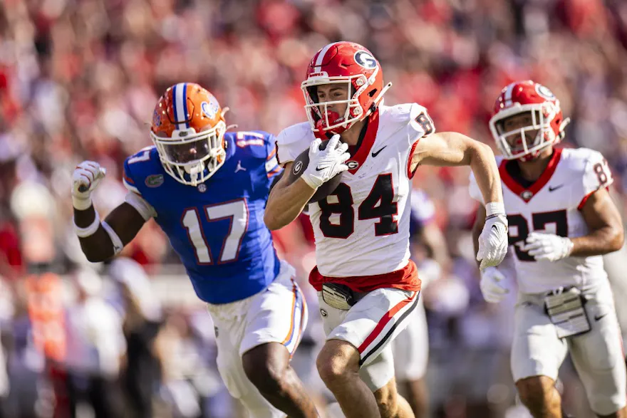 Ladd McConkey of the Georgia Bulldogs scores a touchdown during the first half of a game against the Florida Gators at EverBank Stadium. We're backing McConkey in our NFL Draft player props & expert picks.