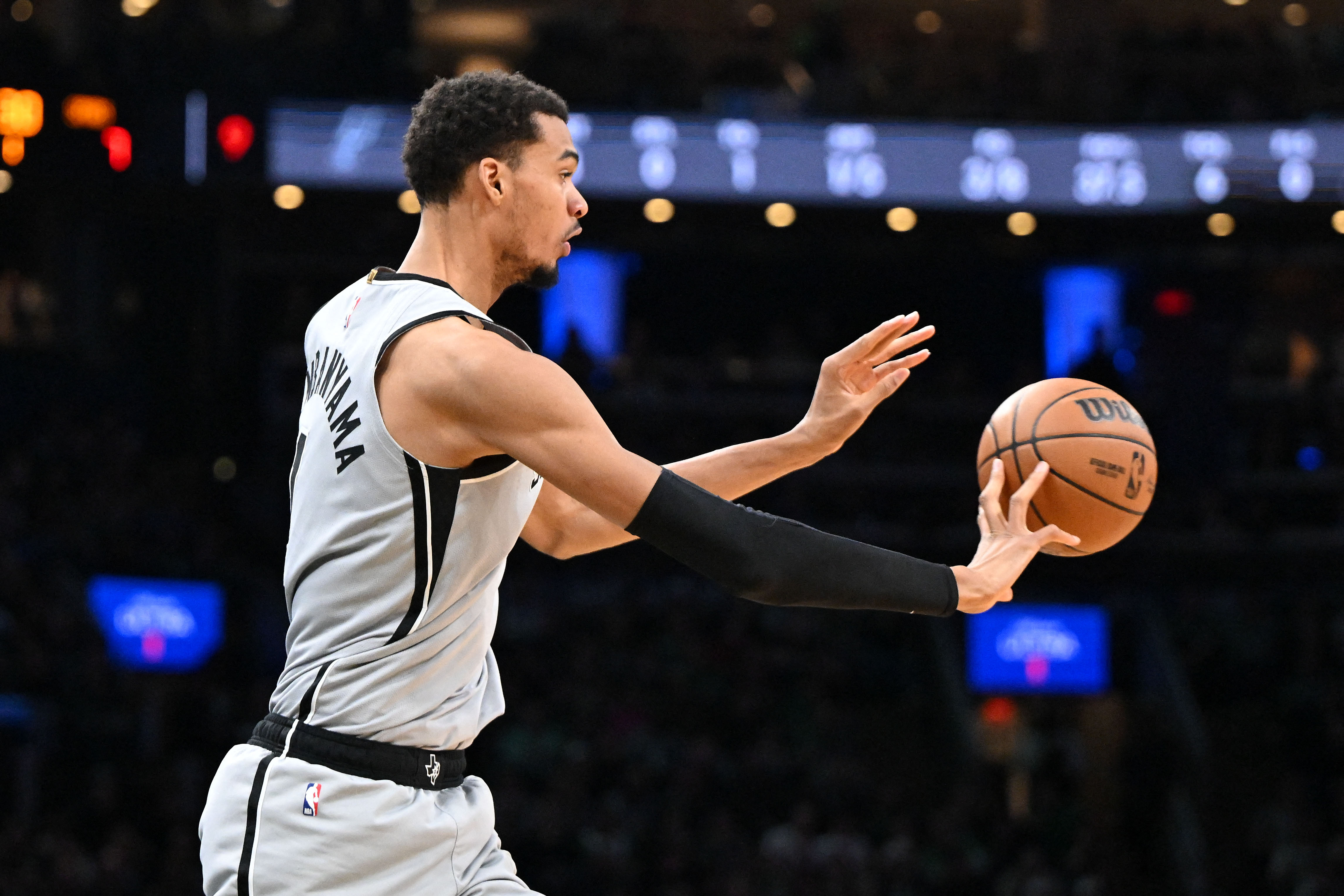 San Antonio Spurs forward Victor Wembanyama passes the ball as we make our NBA best bets today.