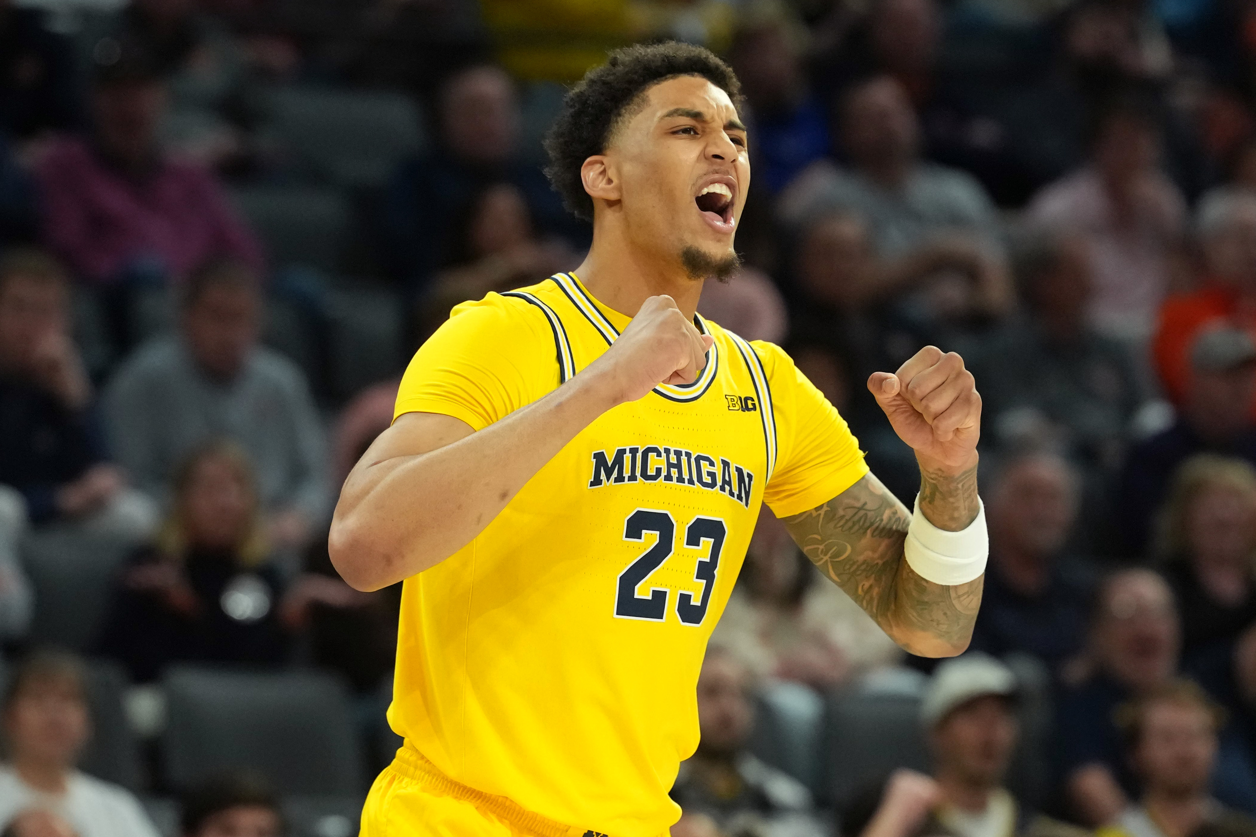 Michigan Wolverines forward Yaxel Lendeborg (23), seen here reacting, is featured in our Michigan vs. Duke prediction tonight.