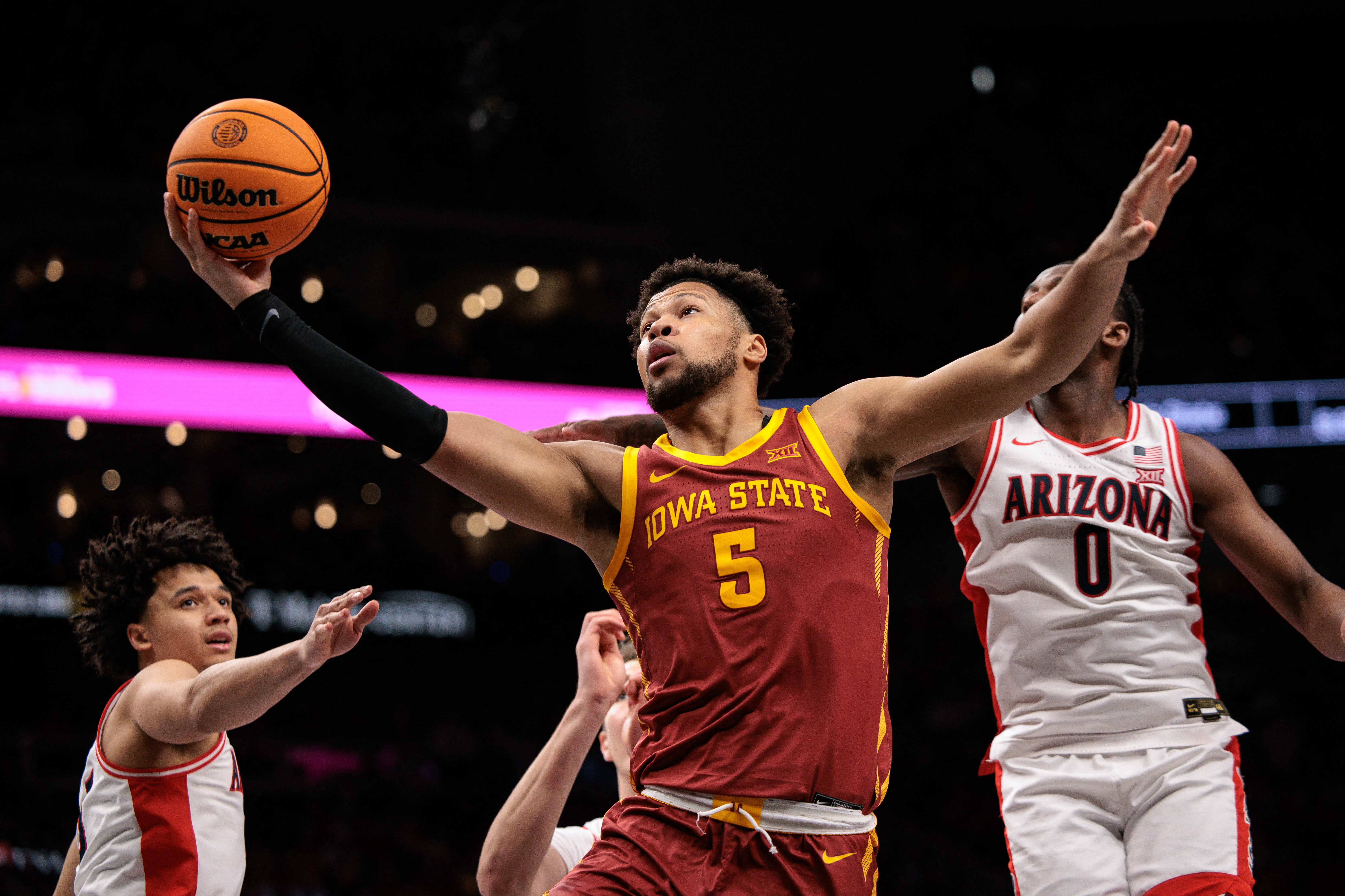 Iowa State Cyclones forward Joshua Jefferson (5) rebounds against the Arizona Wildcats. Iowa State leads our Midwest Region predictions.