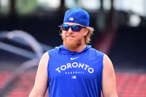 Toronto Blue Jays designated hitter Justin Turner looks on before a game as we look at our Astros vs. Blue Jays expert player props for July 1 Canada Day