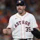Justin Verlander of the Houston Astros reacts to striking out Pavin Smith of the Arizona Diamondbacks to get out of the seventh inning with two men on base at Minute Maid Park.