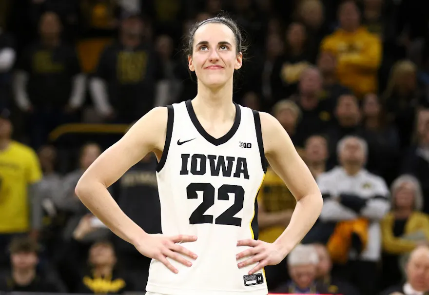 Guard Caitlin Clark #22 of the Iowa Hawkeyes listens as the crowd cheers, as we look at her 2024 WNBA MVP odds.