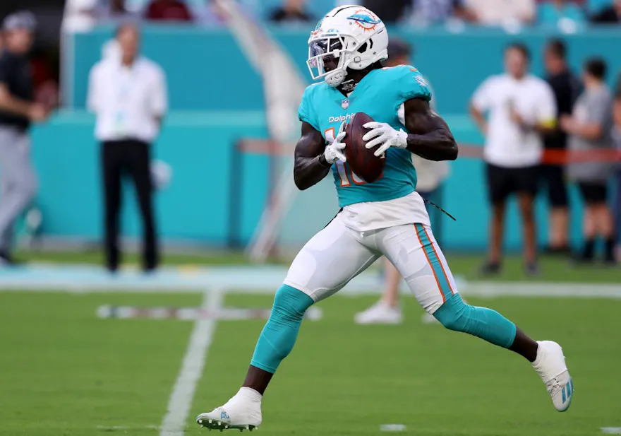 Tyreek Hill of the Miami Dolphins warms up prior to playing the Las Vegas Raiders at Hard Rock Stadium.