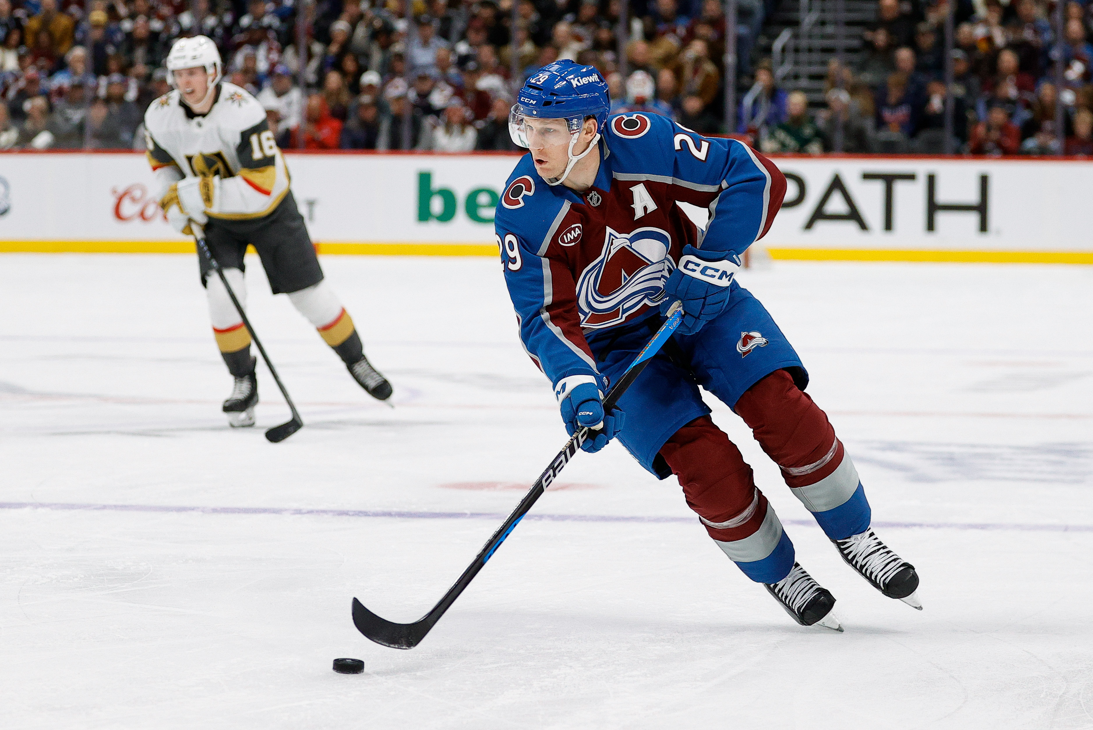 Colorado Avalanche center Nathan MacKinnon (29) controls the puck as we offer our Avalanche vs. Golden Knights player props.