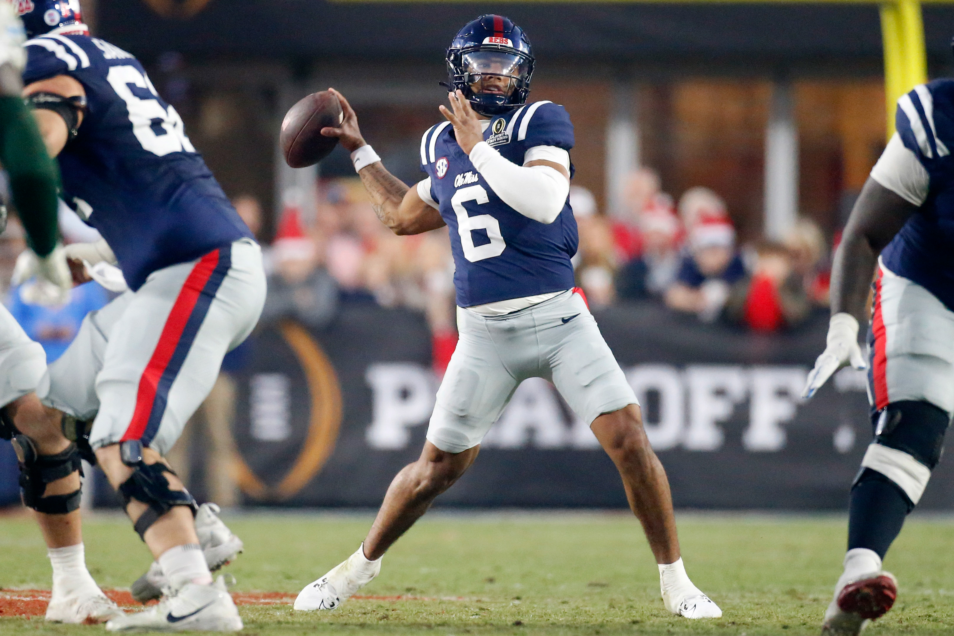 Mississippi Rebels quarterback Trinidad Chambliss passes the ball as we offer our college football best bets for the CFP semifinals