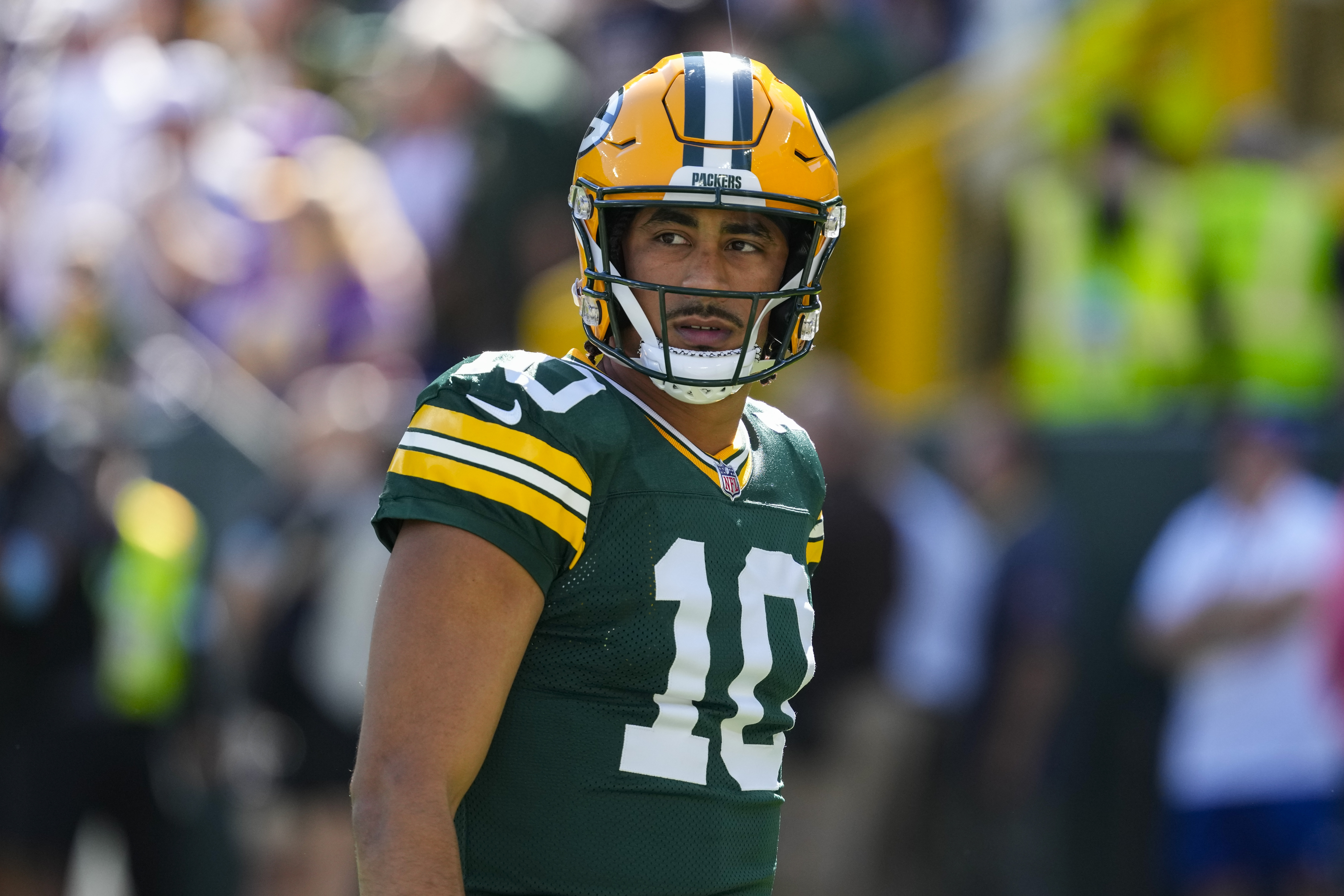 Green Bay Packers quarterback Jordan Love looks on during warmups prior to the game against the Minnesota Vikings at Lambeau Field as we look at our NFL Week 5 player prop Picks.