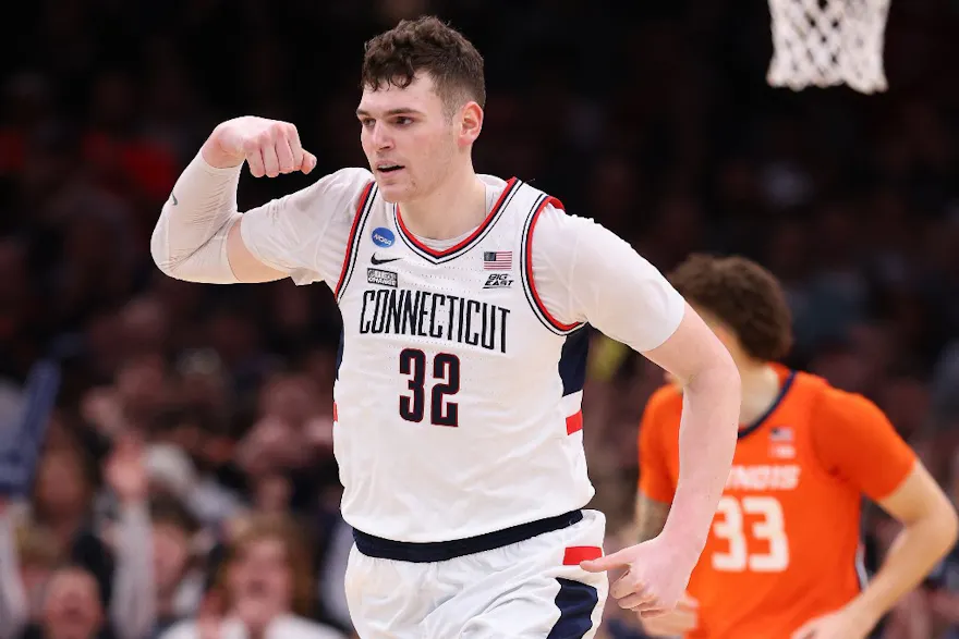 Donovan Clingan of the Connecticut Huskies reacts against the Illinois Fighting Illini during the second half in the Elite Eight round of the NCAA Men's Basketball Tournament. We're back Clingan in our March Madness player props & best bets.