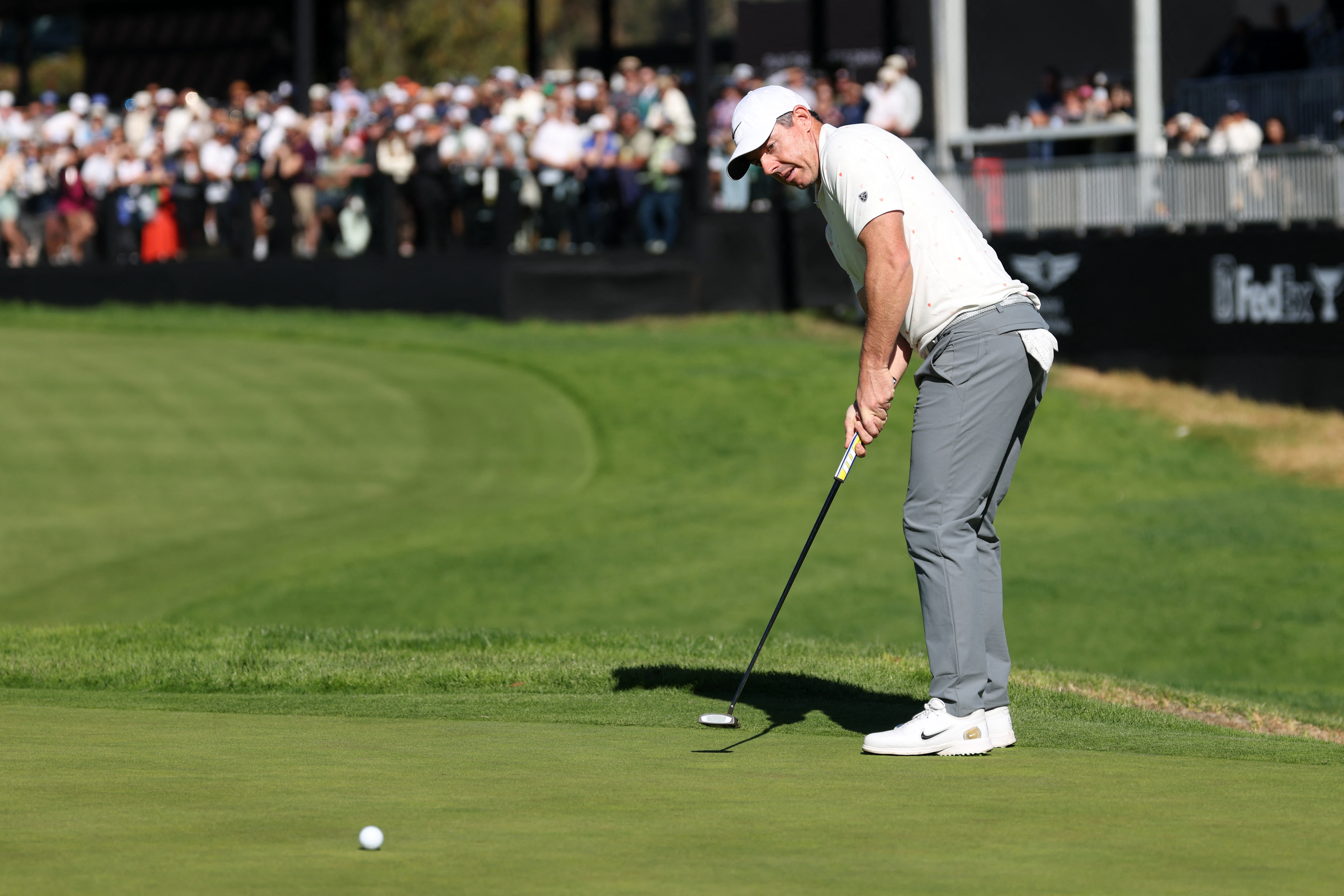Rory McIlroy putts as he is featured in our Players Championship odds favorites field.