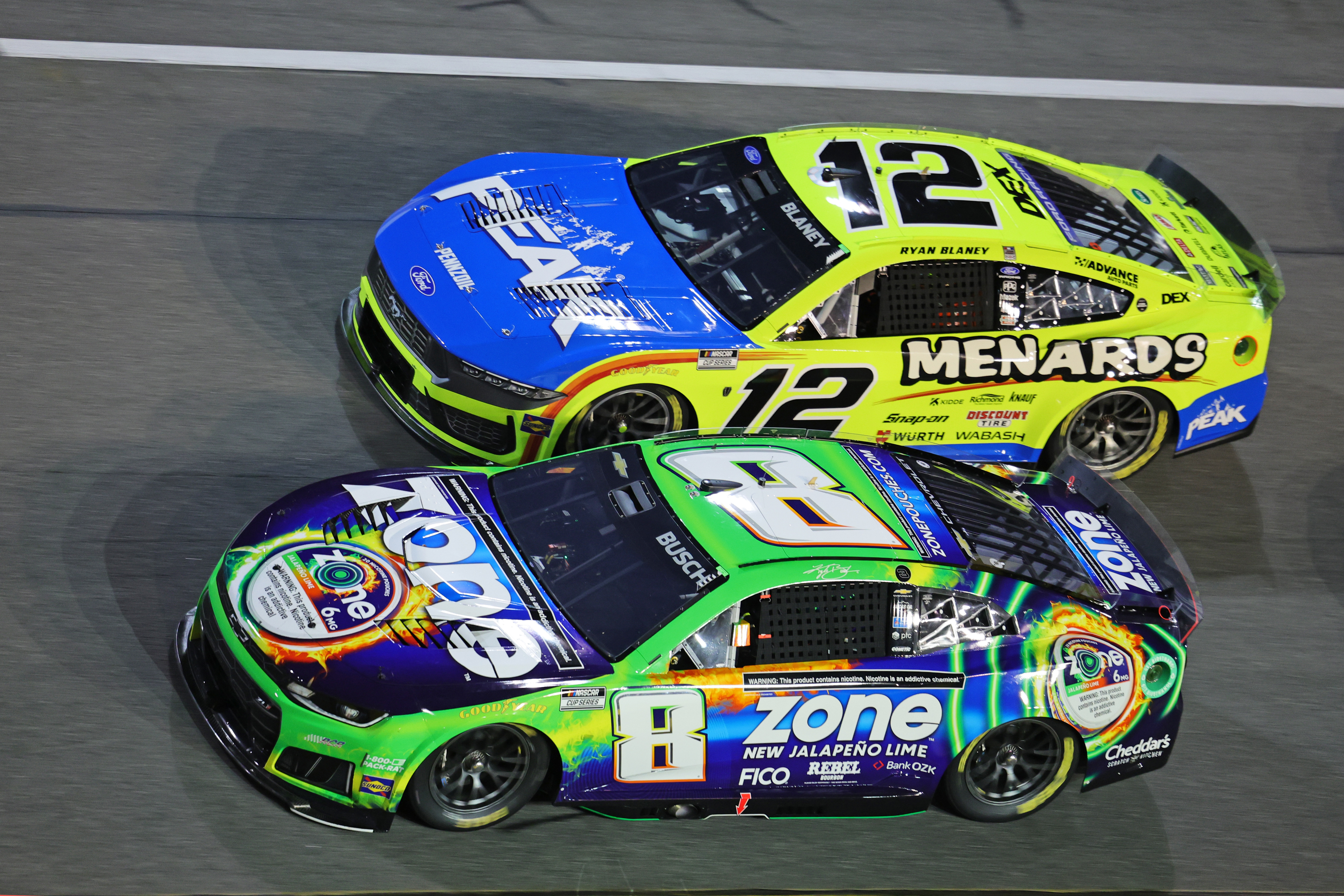 Driver Kyle Busch (8) and driver Ryan Blaney (12), who are both featured in our Daytona 500 prop bets, race during the Duel 1 at Daytona at Daytona International Speedway.