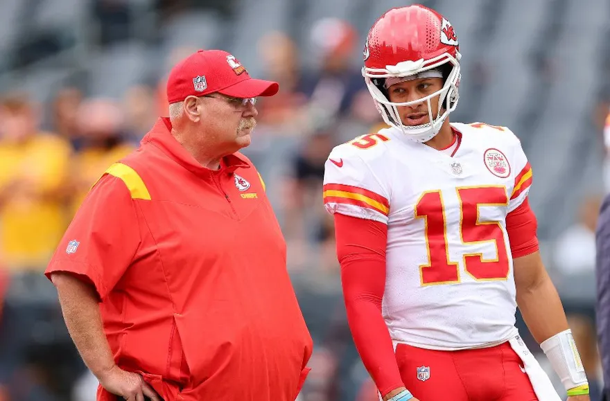 Head coach Andy Reid and Patrick Mahomes of the Kansas City Chiefs talk prior to a preseason game against the Chicago Bears, and we offer our top NFL win total predictions based on the best NFL odds.