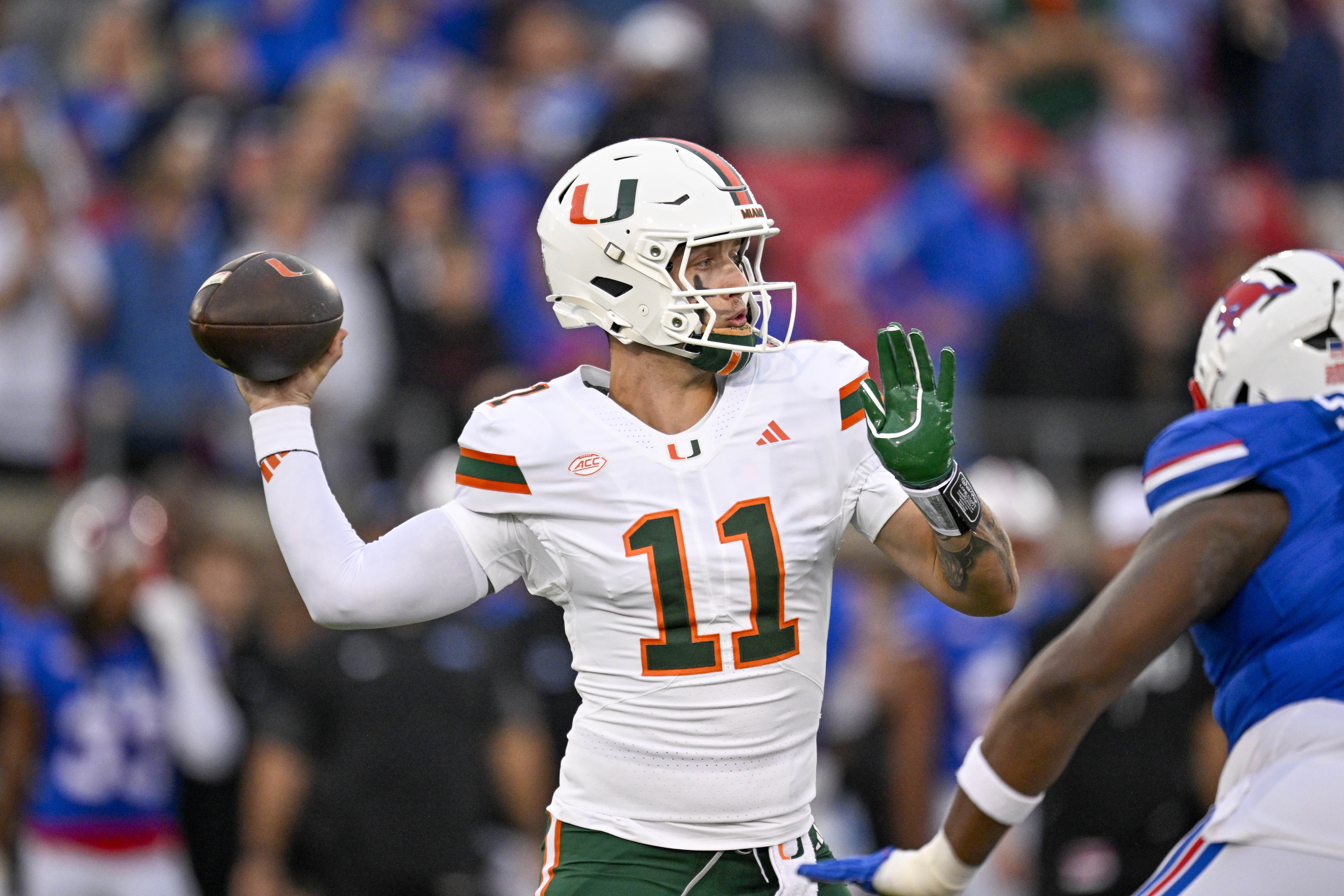 Miami quarterback Carson Beck (11) throws the ball as we offer our Miami vs. Texas A&M same-game parlay.