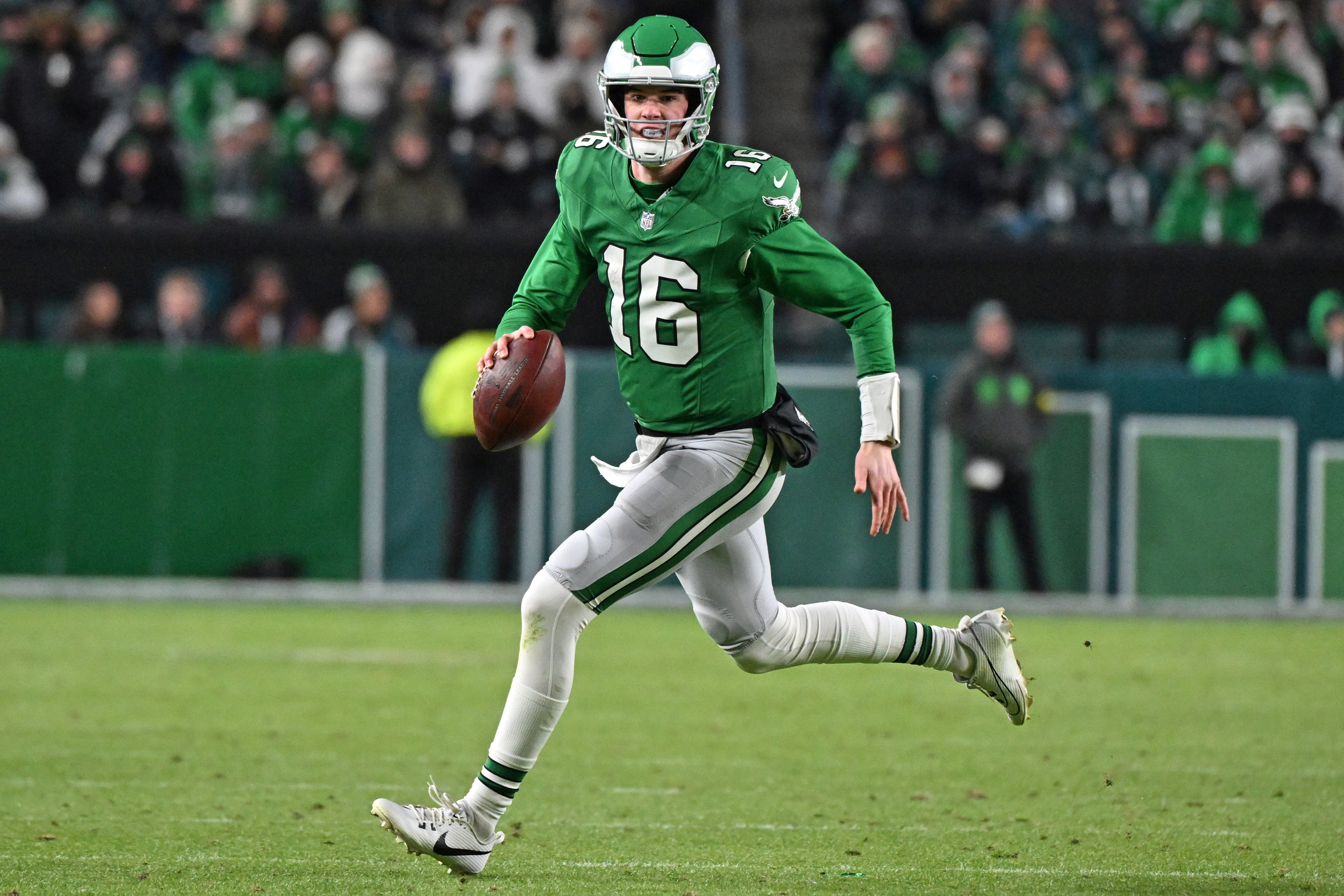 Philadelphia Eagles quarterback Tanner McKee (16) looks on as he is featured in our Eagles vs. Ravens prediction.
