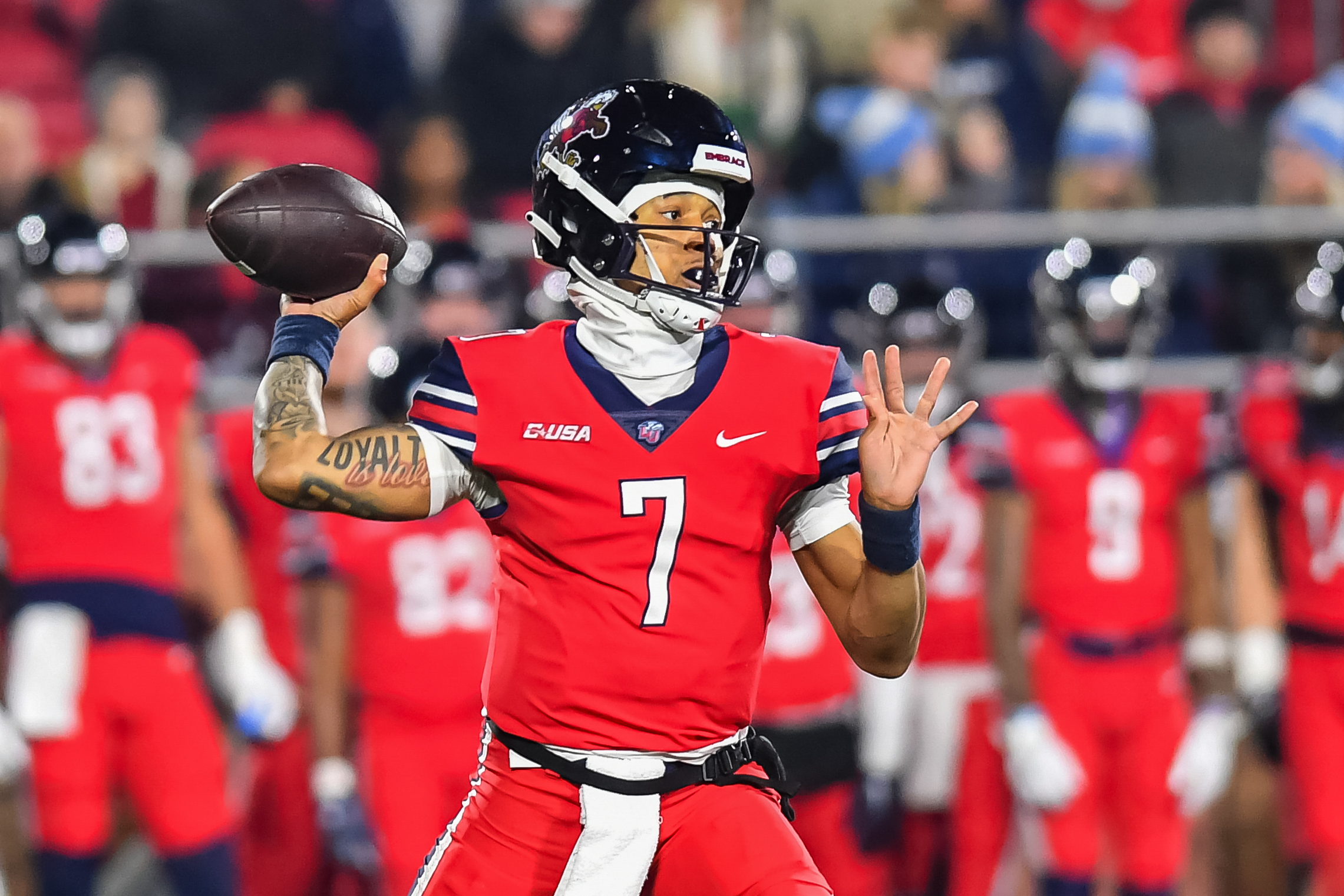 Liberty quarterback Kaidon Salter throws a pass during against New Mexico State. Liberty is among the Group of Five favorites to reach the College Football Playoff.
