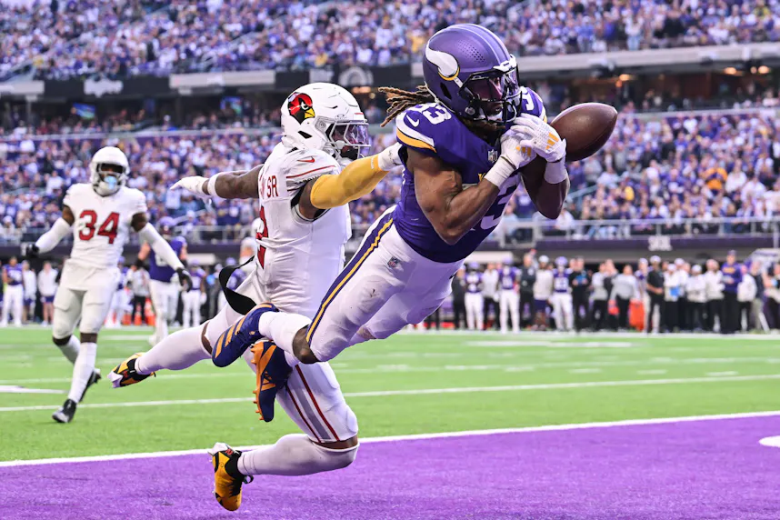 Arizona Cardinals linebacker Mack Wilson Sr. breaks up the pass for Minnesota Vikings running back Aaron Jones as we look at the best NFL odds Week 15.