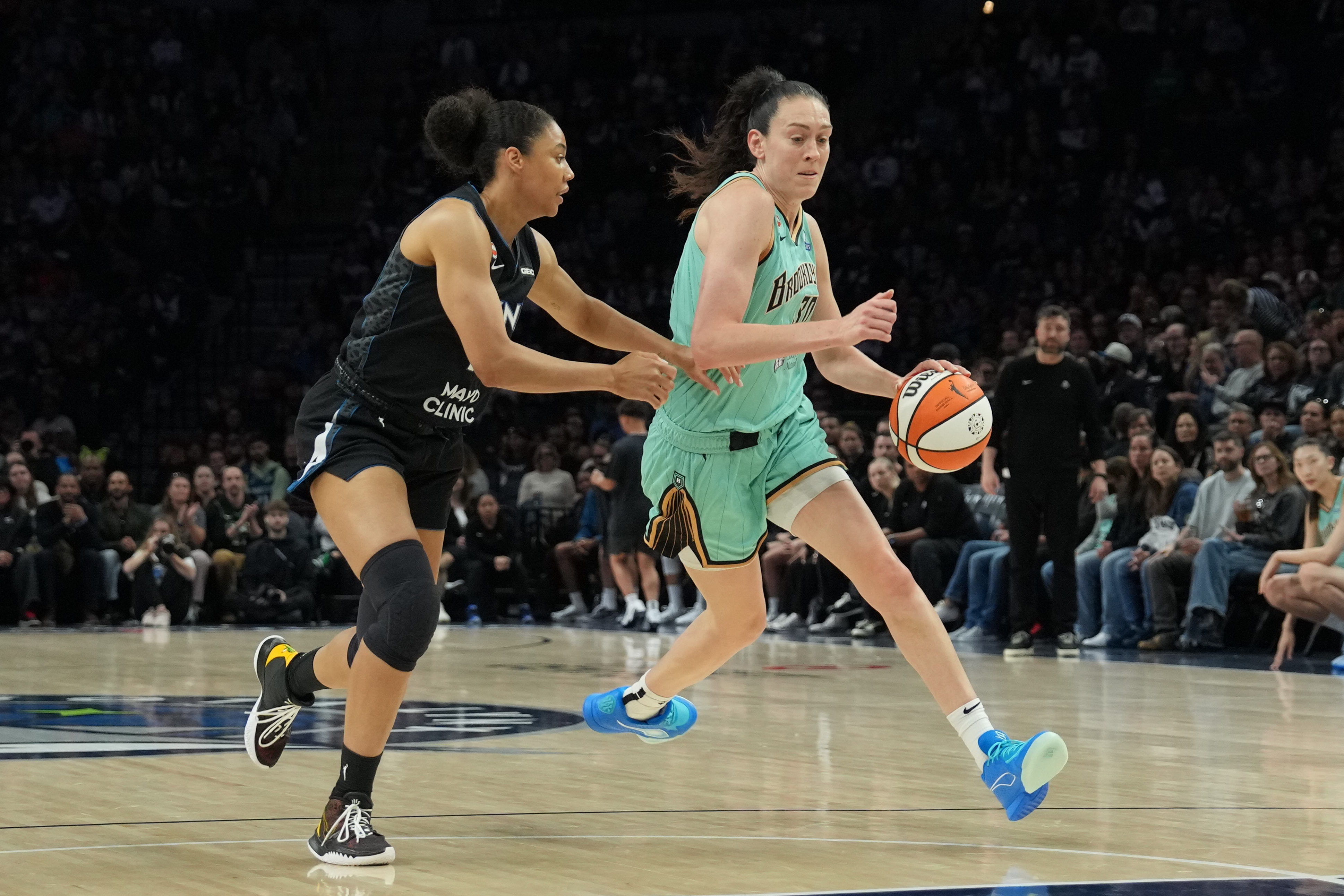 New York Liberty forward Breanna Stewart (30) dribbles the ball as she is featured in our Dream vs. Liberty prediction.