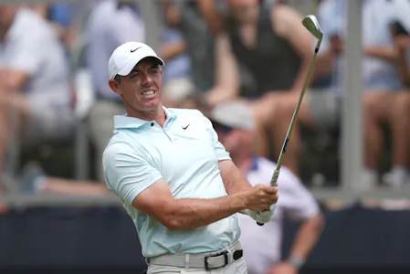 Rory McIlroy hits from the tee box as we look at the Travelers Championship odds and favorites.