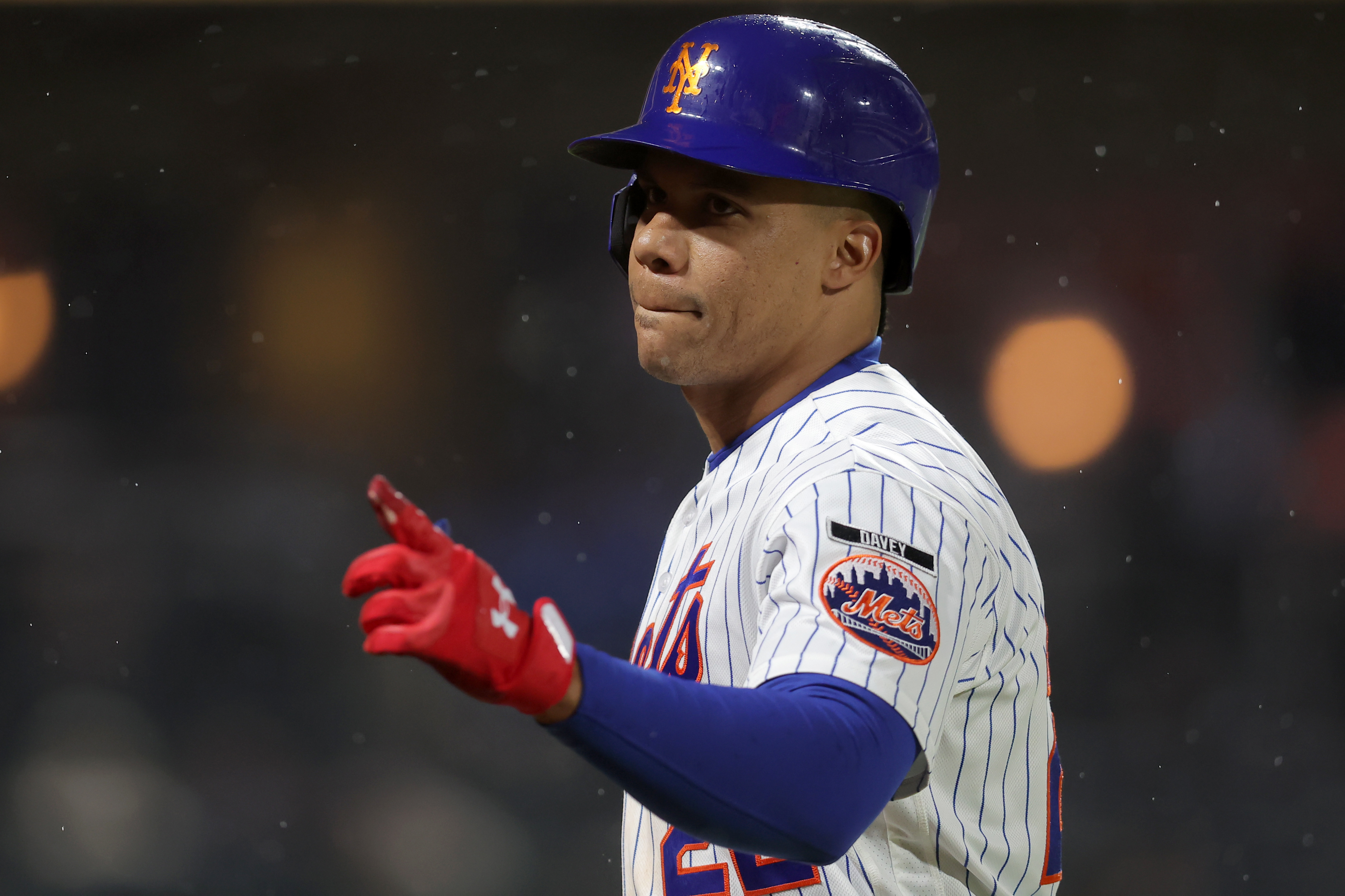 New York Mets designated hitter Juan Soto (22), seen here pointing into the stands, is featured in our home run predictions tonight.