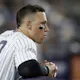 Aaron Judge of the New York Yankees looks on from the dugout during the seventh inning against the Tampa Bay Rays, and we show new U.S. bettors how they can access our exclusive BetRivers promo code for Tuesday's game.