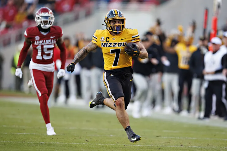 Cody Schrader of the Missouri Tigers runs the ball in the first half of the game against the Arkansas Razorbacks, and we offer new U.S. bettors our exclusive BetRivers bonus code for Missouri vs. Ohio State.