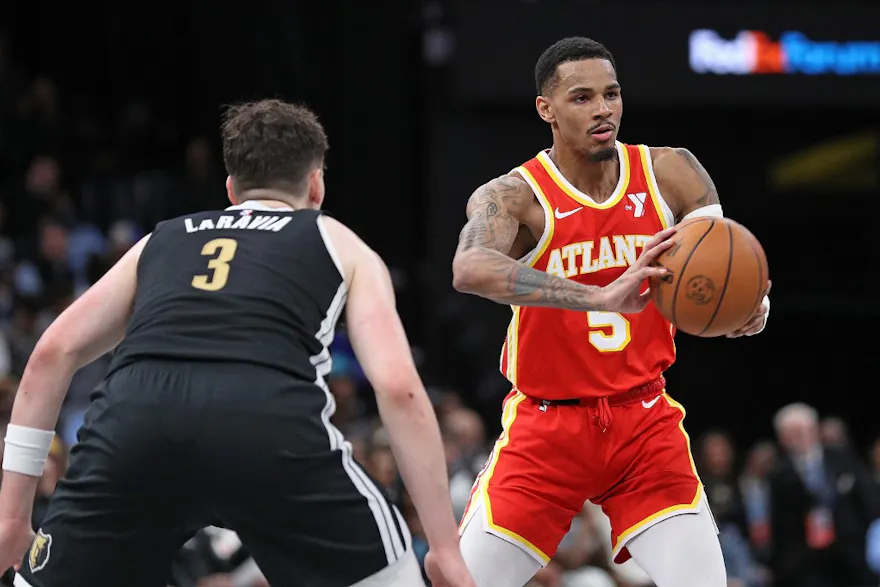 Dejounte Murray #5 of the Atlanta Hawks passes the ball as we look at our best NBA player props and best bets for Celtics vs. Hawks