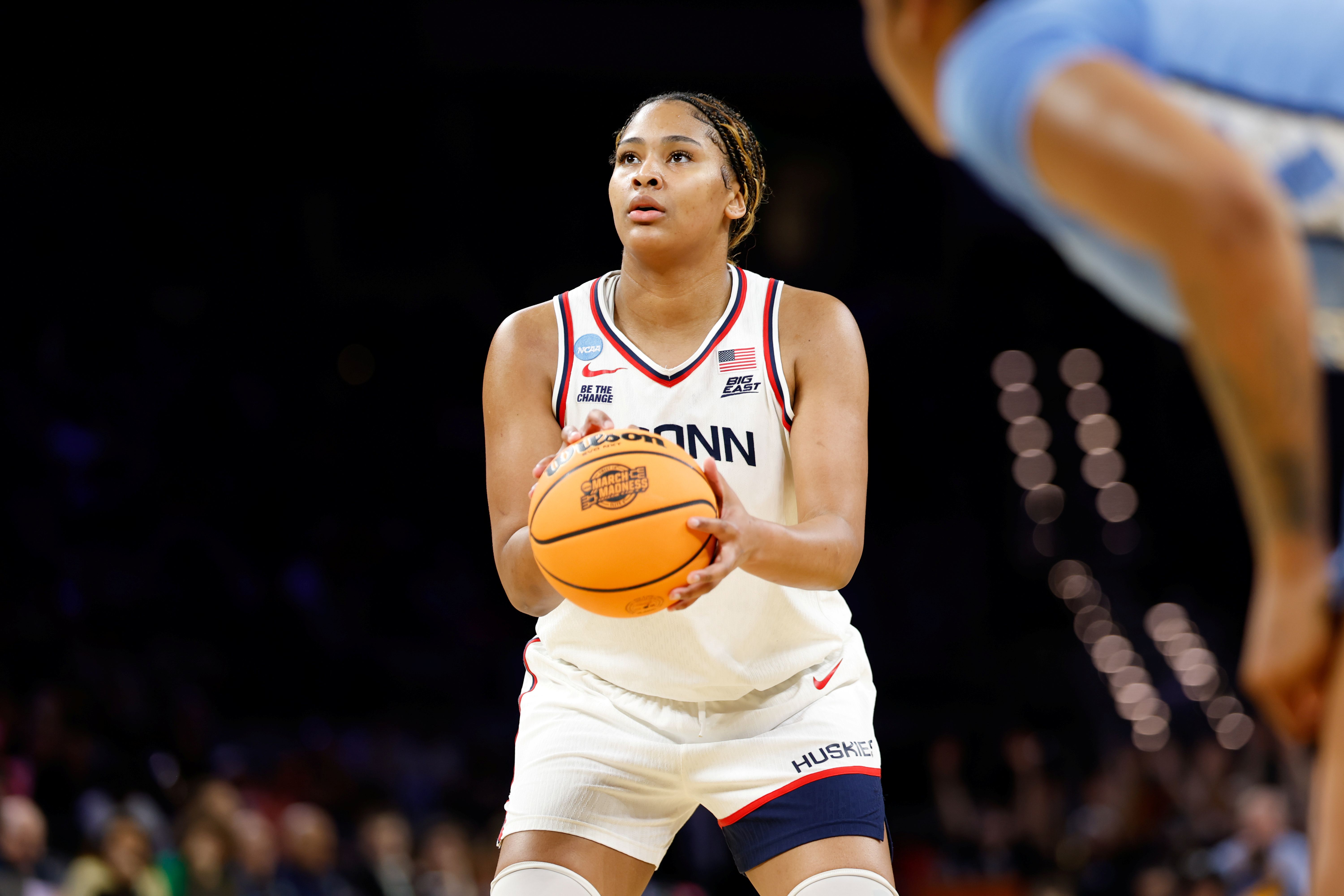 UConn Huskies forward Sarah Strong shoots a free throw, and she's key as we look at our Notre Dame vs. UConn prediction. 