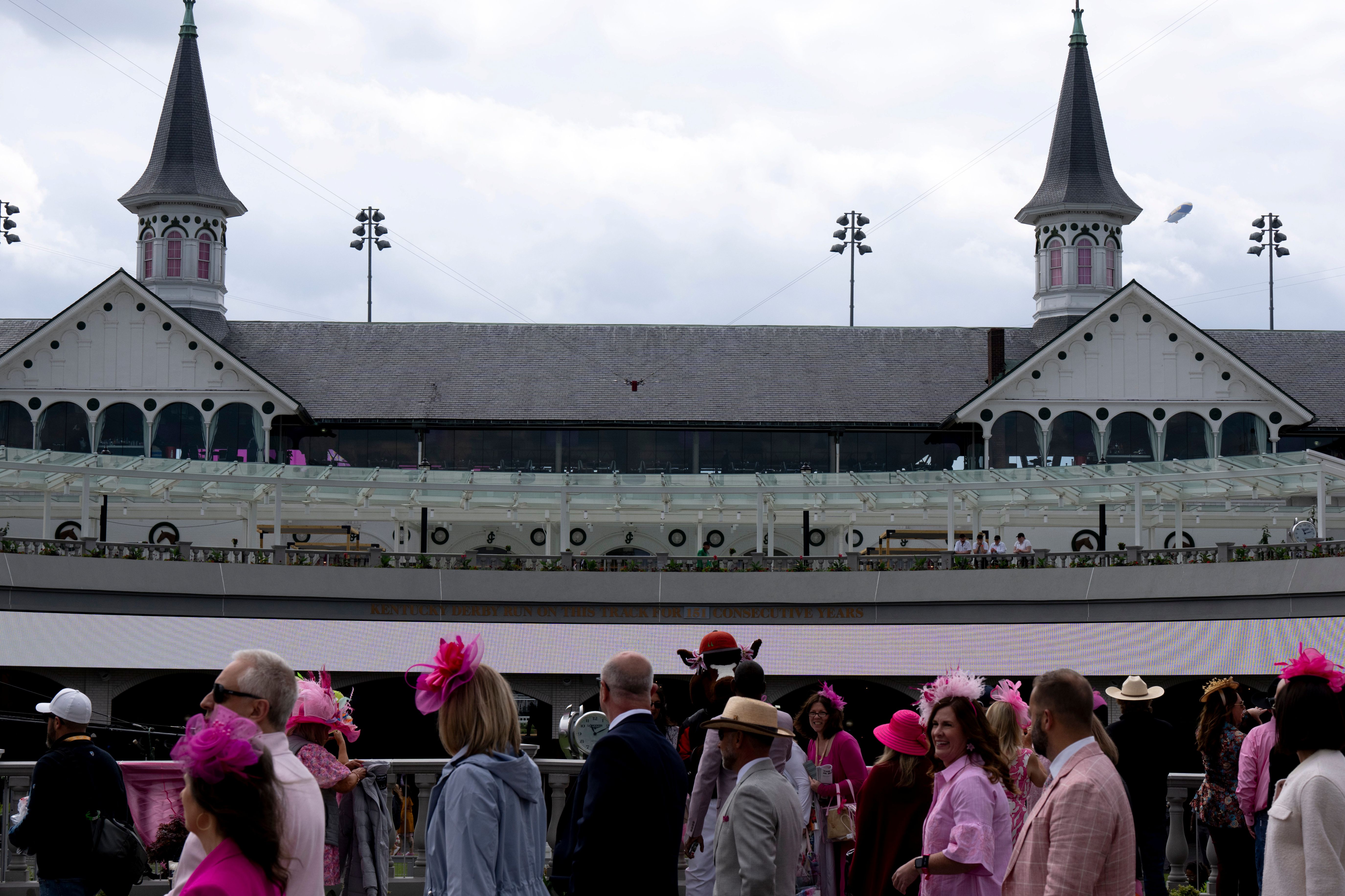 People gather for the Kentucky Oaks Day at Churchill Downs in Louisville on Friday, May 1, 2026.