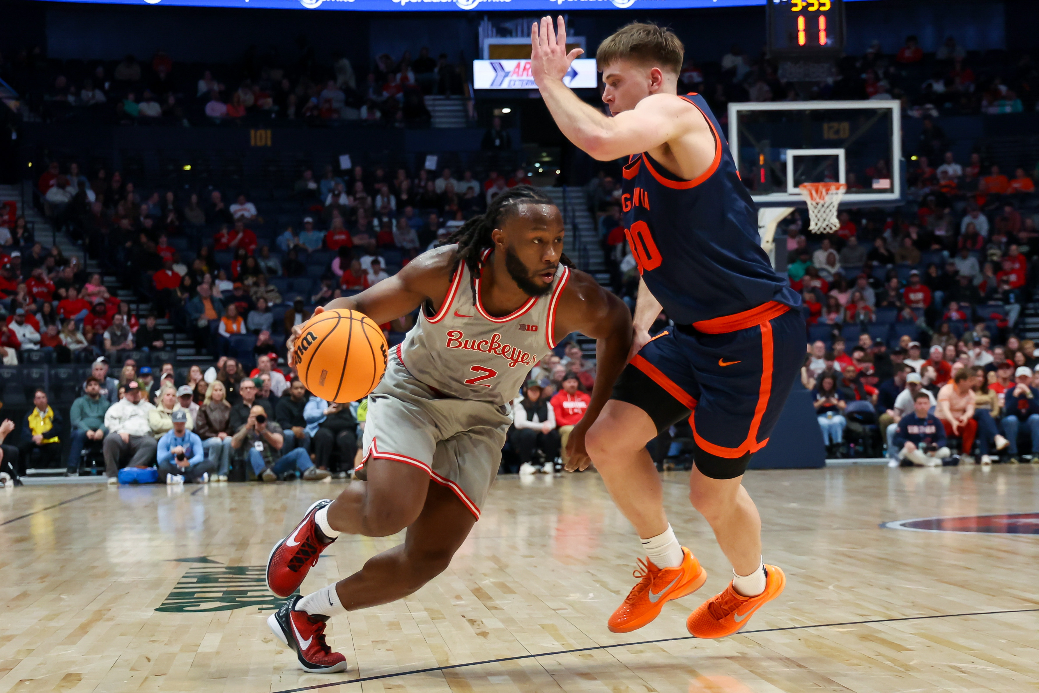 Ohio State Buckeyes guard Bruce Thornton drives to the basket as we make our college basketball best bets.