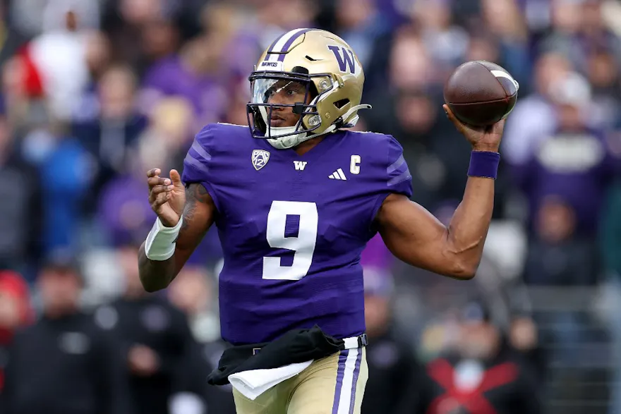 Michael Penix Jr. #9 of the Washington Huskies passes as we make our College Football Playoff player props predictions and picks for Monday's CFP slate on New Year's Day.