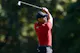 Tiger Woods of the United States plays his shot on the second hole as we look at Tiger Woods U.S. Open odds