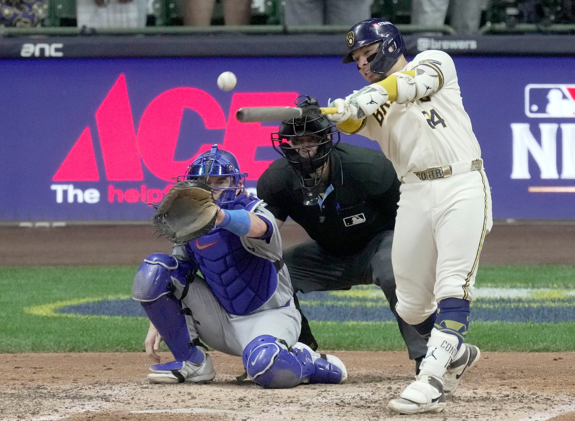 Milwaukee Brewers catcher William Contreras (24) hits an RBI single in the sixth inning of the National League Championship Series against the Los Angeles Dodgers, as we take a closer look at the 2026 World Series odds.
