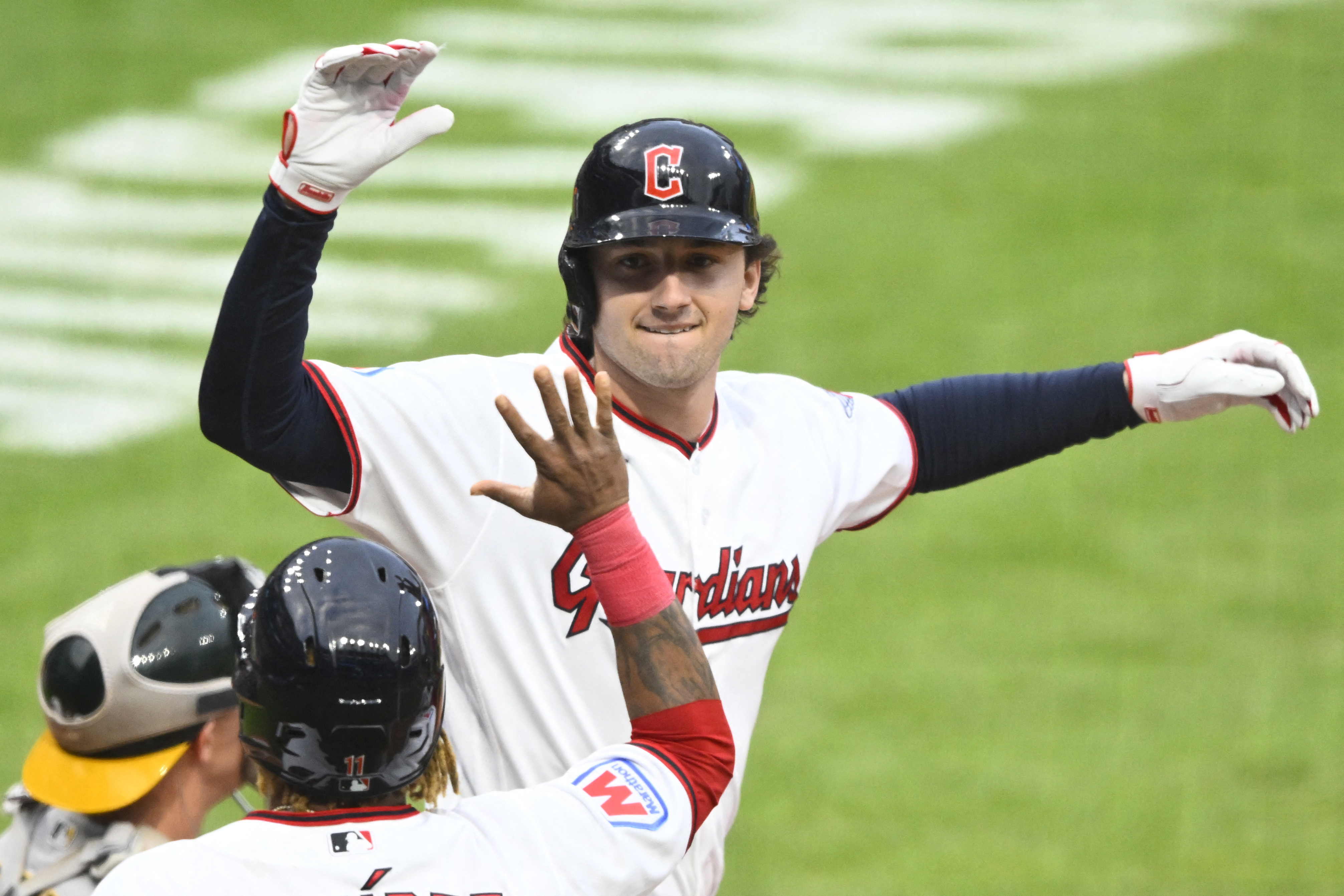 Guardians designated hitter Chase DeLauter (24) celebrates as we break down our Guardians vs. Red Sox prediction.