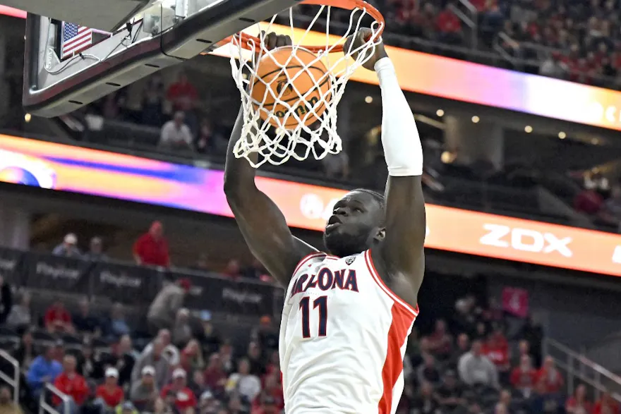Oumar Ballo #11 of the Arizona Wildcats dunks the ball as we look at our DraftKings promo code for March Madness