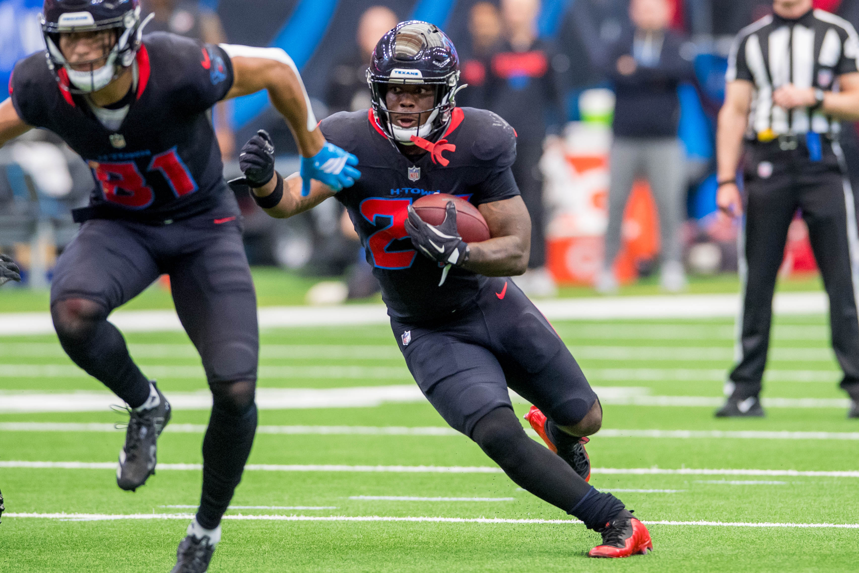 Houston Texans running back Woody Marks (27), who is featured in our Texans vs. Steelers prediction for NFL Wild Card Weekend, carries the ball.