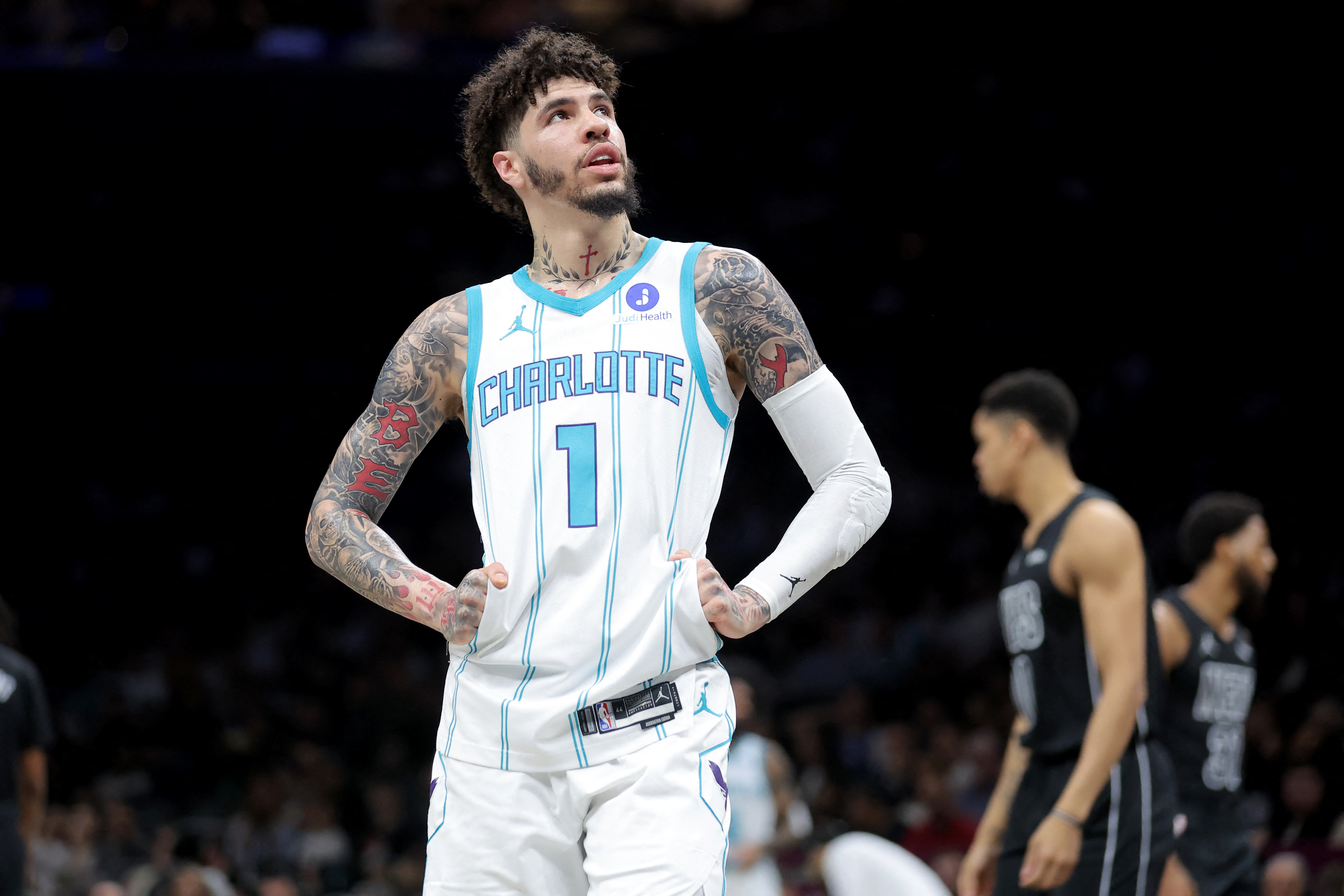 Charlotte Hornets guard LaMelo Ball (1), seen here reacting during a game, is featured in our Heat vs. Hornets player props tonight.