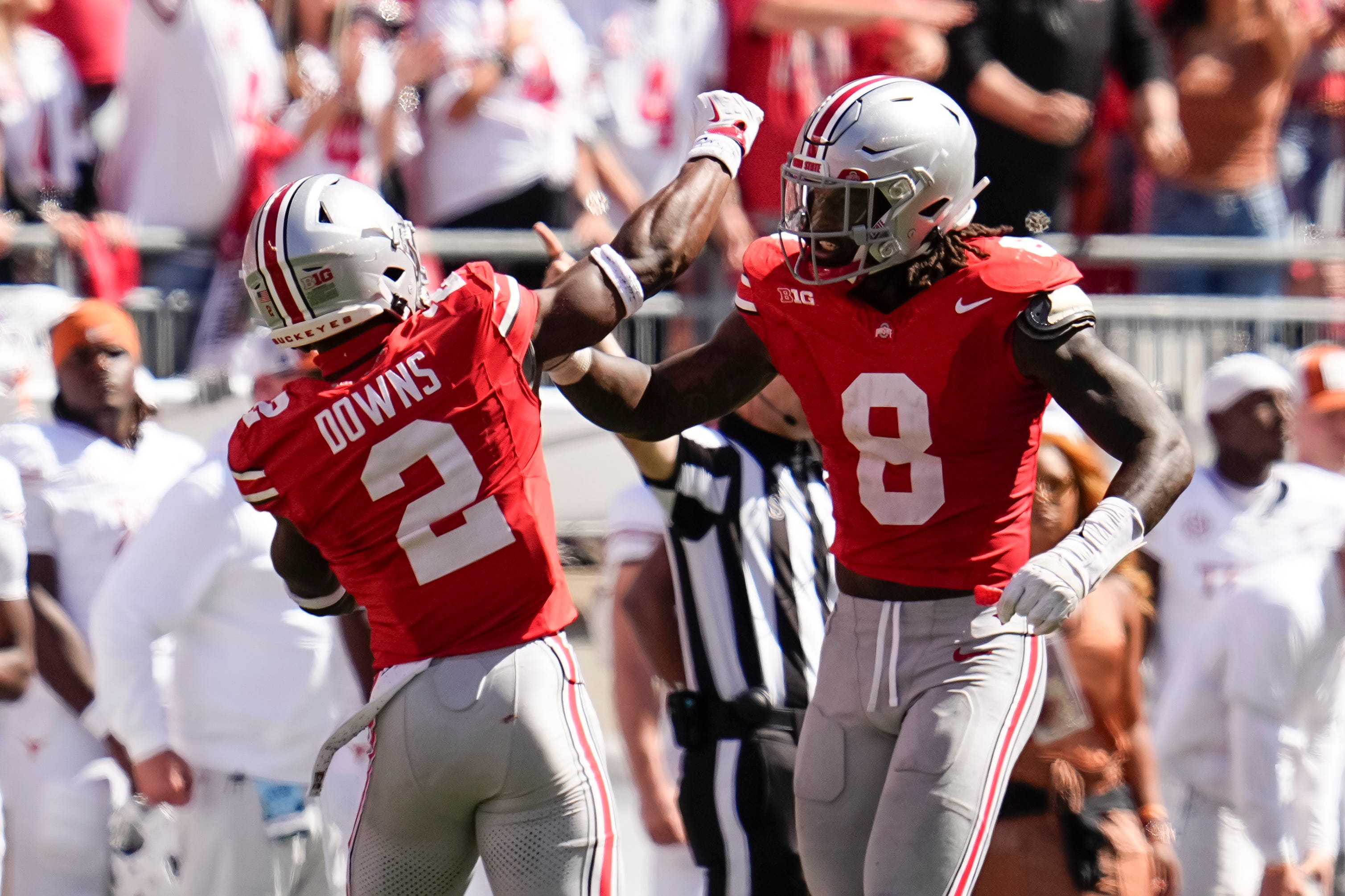 Ohio State Buckeyes safety Caleb Downs (2) and linebacker Arvell Reese (8) celebrate during the second half against the Texas Longhorns at Ohio Stadium.