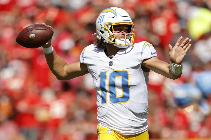 Justin Herbert of the Los Angeles Chargers throws the ball during the first quarter in the game against Kansas City Chiefs at Arrowhead Stadium.