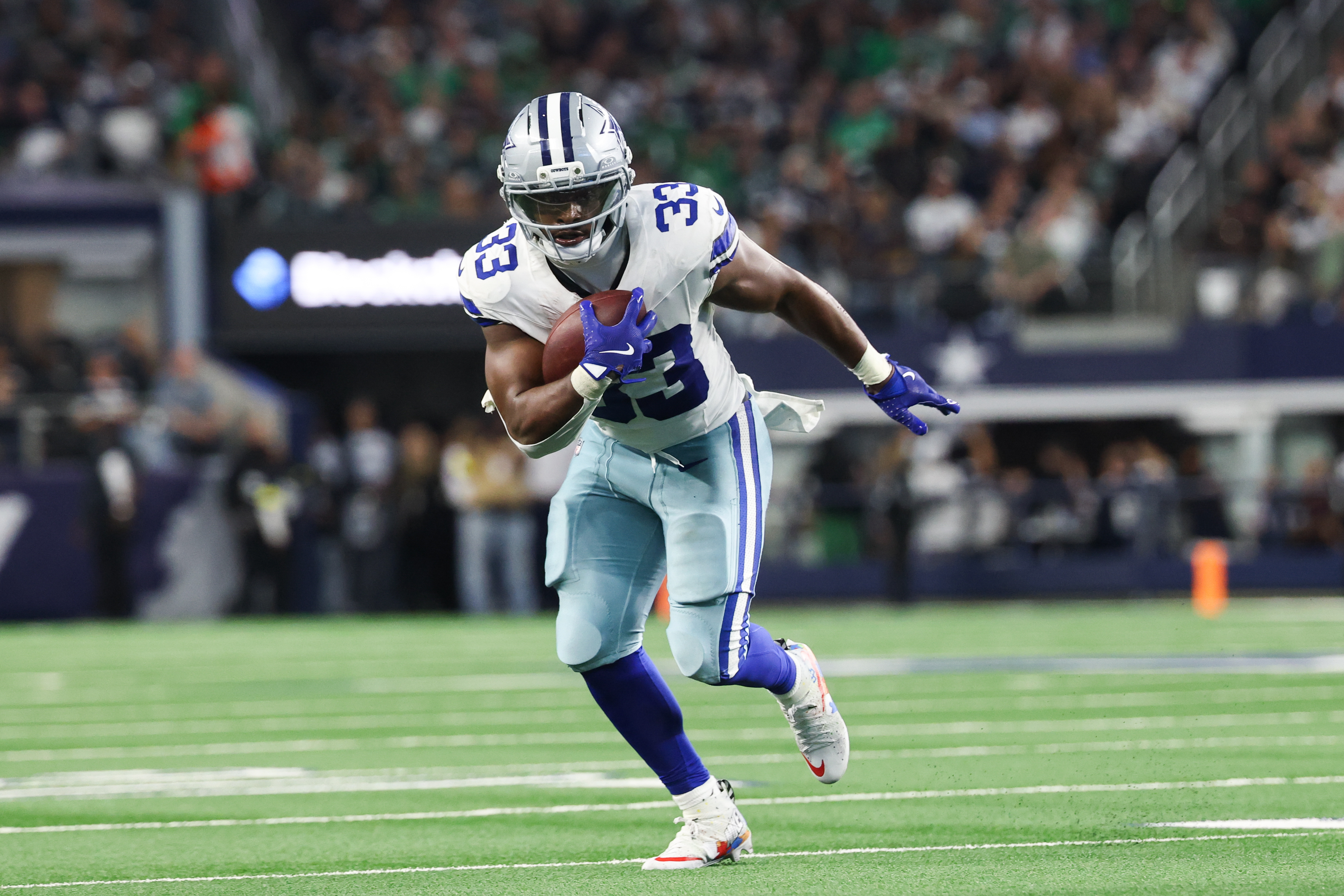 Dallas Cowboys running back Javonte Williams runs with the ball as we make our best Cowboys vs. Commanders same-game parlay for Christmas Day.