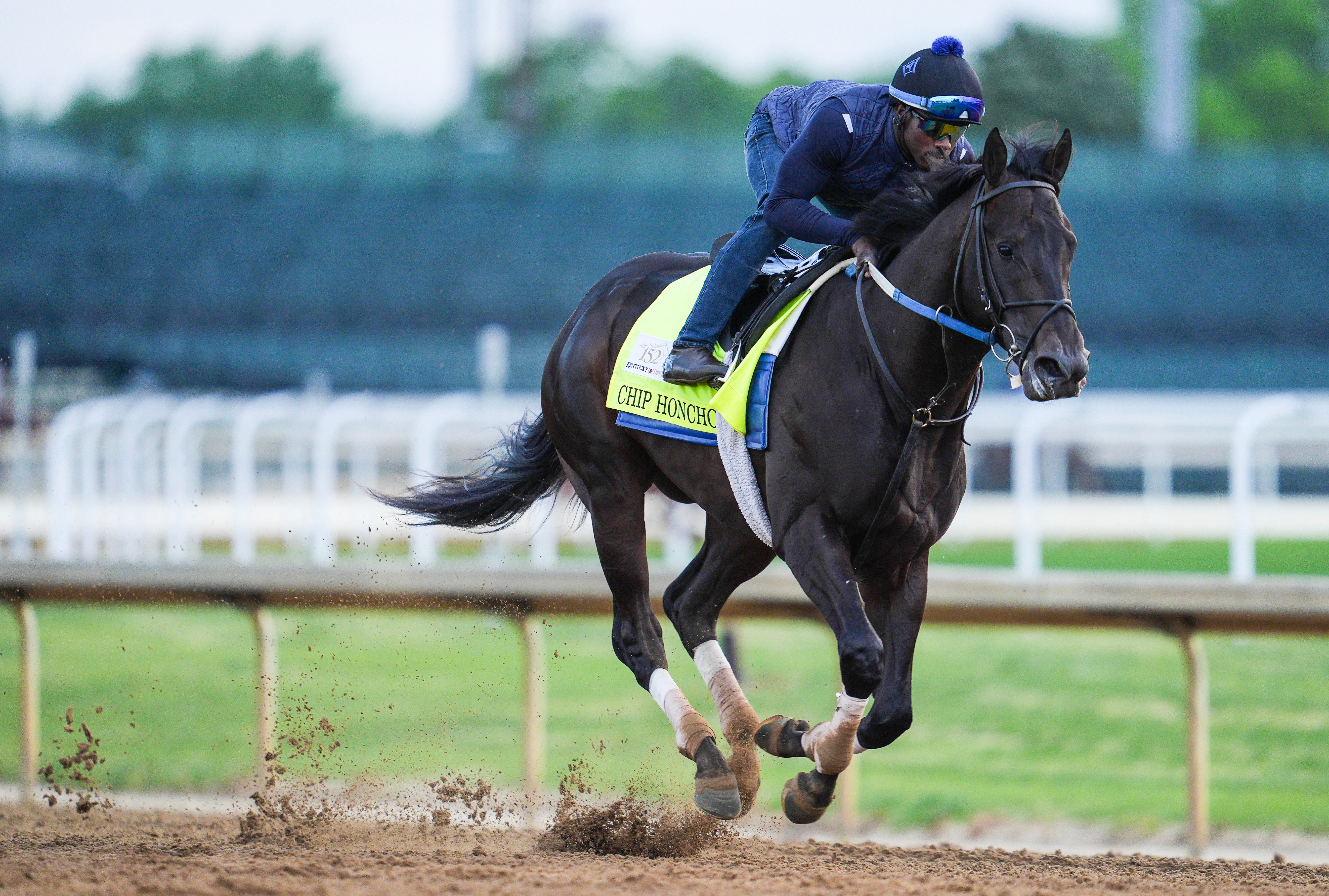2026 Kentucky Derby contender Chip Honcho works out at Churchill Downs with exercise rider Roberto Howell.