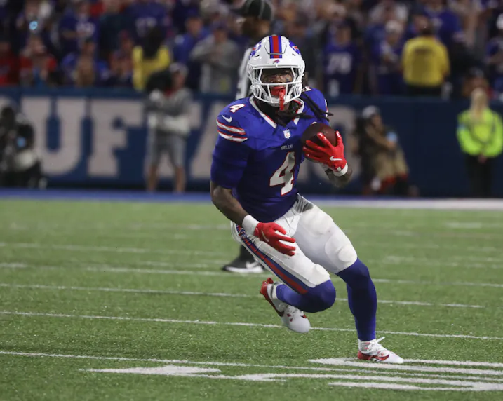 Bills running back James Cook runs the ball in the open field as we make our first touchdown scorer predictions for Sunday Night Football.
