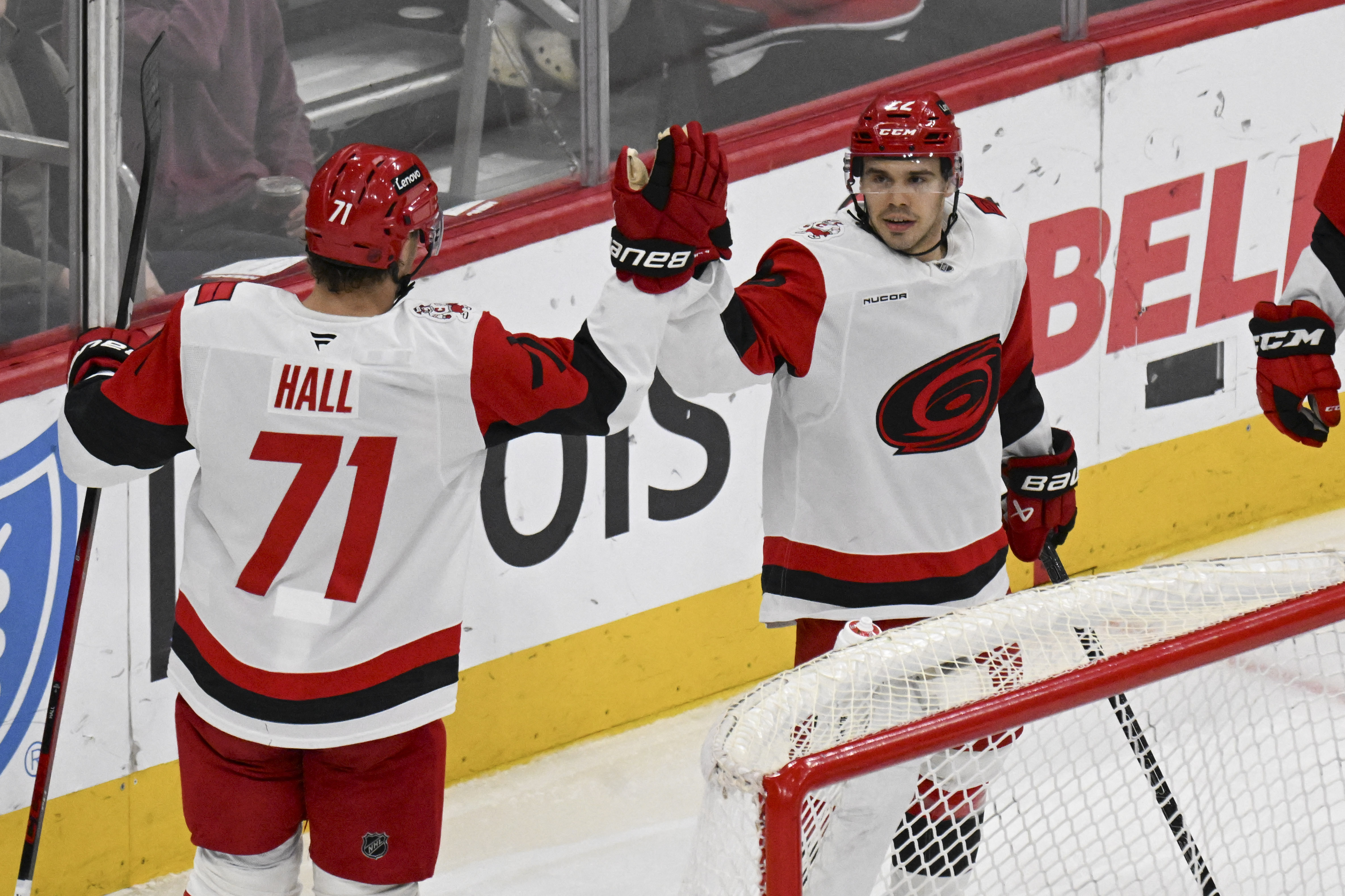 Carolina Hurricanes center Logan Stankoven (22) celebrates with winger Taylor Hall (71) as we provide our Hurricanes vs. Senators Game 4 prediction.